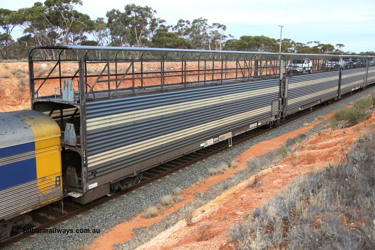 160524 3742
West Kalgoorlie, 2PM6 intermodal train, articulated 2-pack triple deck automobile waggon RMEY 2419, converted by Cheeseman Engineering in 2004 from a former 1971 vintage AE Goodwin built GNX automobile waggon ANMX 2419 and another ANMX waggon.
Keywords: RMEY-type;RMEY2419;Cheeseman-Engineering-SA;AE-Goodwin;GNX-type;AMNX-type;