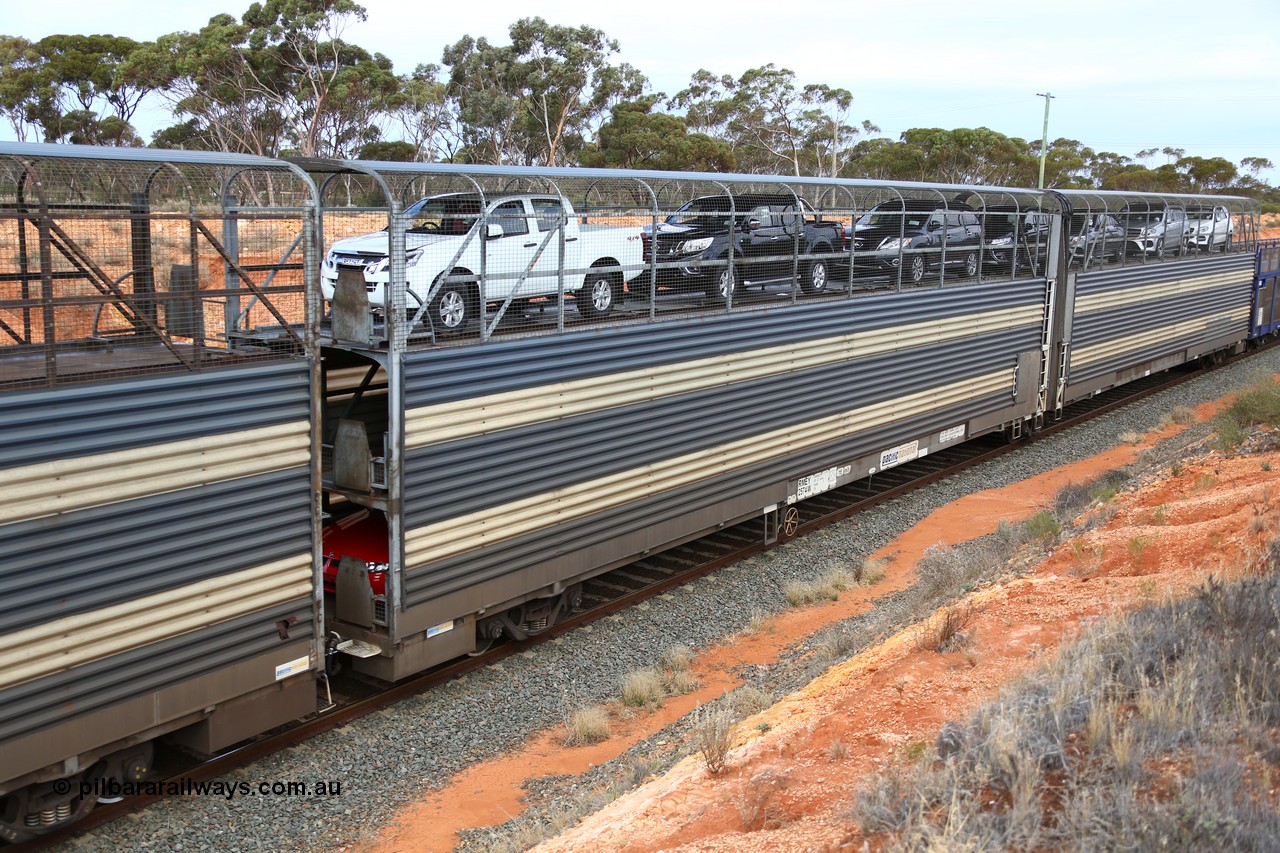 160524 3743
West Kalgoorlie, 2PM6 intermodal train, articulated 2-pack triple deck automobile waggon RMEY 2574, converted by Cheeseman Engineering in 2004 from a former 1972 vintage Comeng Victoria built GNX automobile waggon 2574, later coded ANMX and another ANMX waggon.
Keywords: RMEY-type;RMEY2574;Cheeseman-Engineering-SA;Comeng-Vic;GNX-type;AMNX-type;