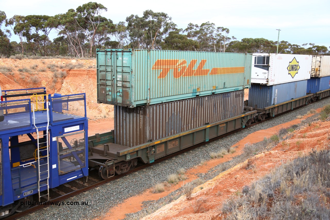 160524 3746
West Kalgoorlie, 2PM6 intermodal train, RRXY 3 platform 1 of 5-pack well waggon set, one of eleven built by Bradken Qld in 2002 for Toll from a Williams-Worley design with a 48' Toll box TCML 48563 on top of a 40' RTPH 4050 box.
Keywords: RRXY-type;RRXY3;Williams-Worley;Bradken-Rail-Qld;