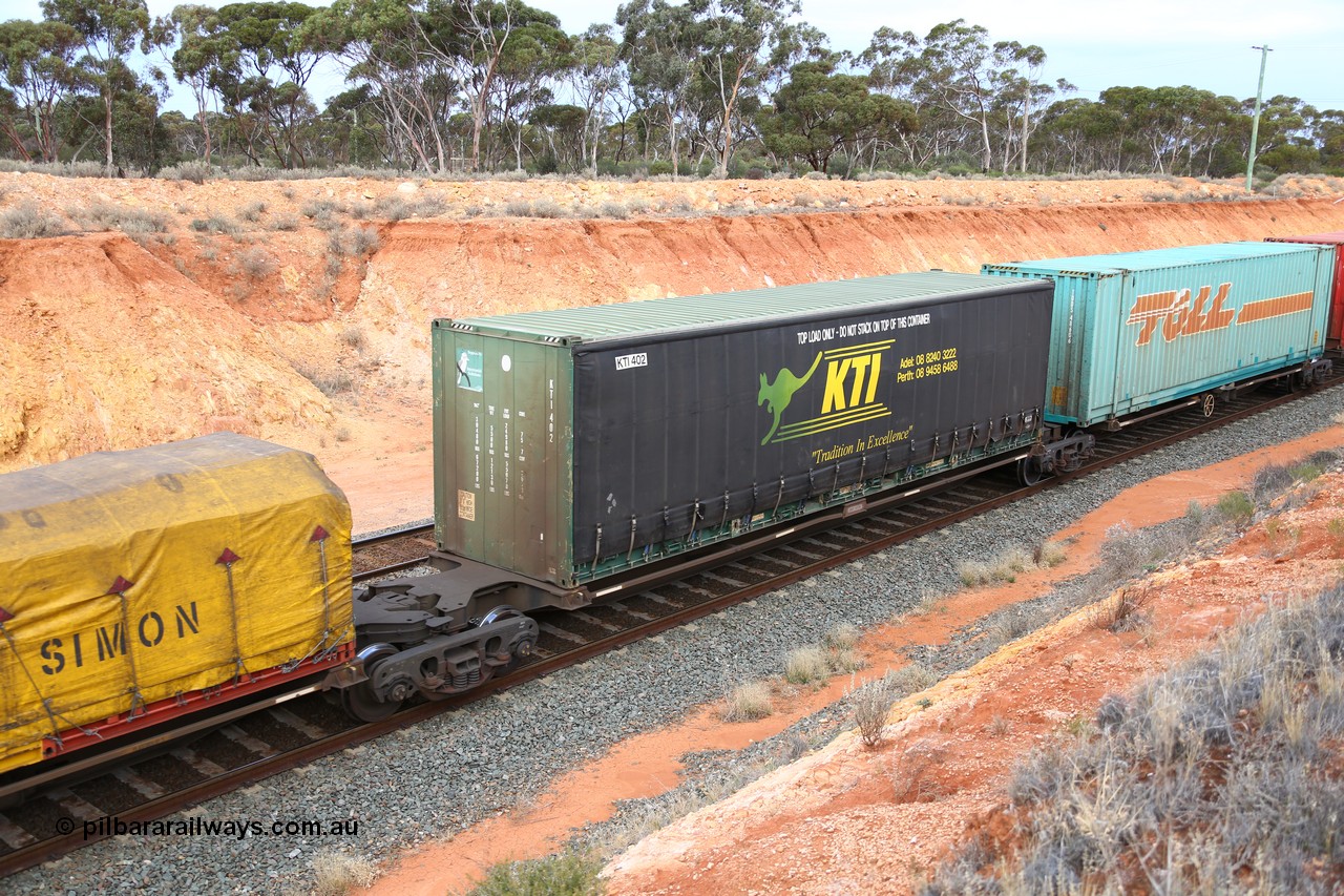 160524 3752
West Kalgoorlie, 2PM6 intermodal train, RRQY 8313 platform 4 of 5-pack articulated skel waggon, one of forty one sets built by Qiqihar Rollingstock Works China in 2006 loaded with a 40' KTI curtainsider KTI 402.
Keywords: RRQY-type;RRQY8313;Qiqihar-Rollingstock-Works-China;