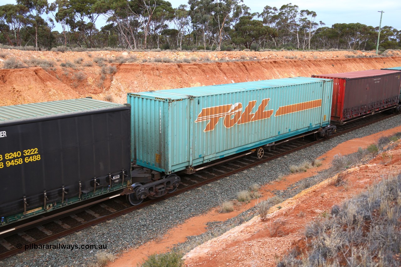 160524 3753
West Kalgoorlie, 2PM6 intermodal train, RRQY 8313 platform 3 of 5-pack articulated skel waggon, one of forty one sets built by Qiqihar Rollingstock Works China in 2006 loaded with a Toll 48' box TDDS 48606.
Keywords: RRQY-type;RRQY8313;Qiqihar-Rollingstock-Works-China;