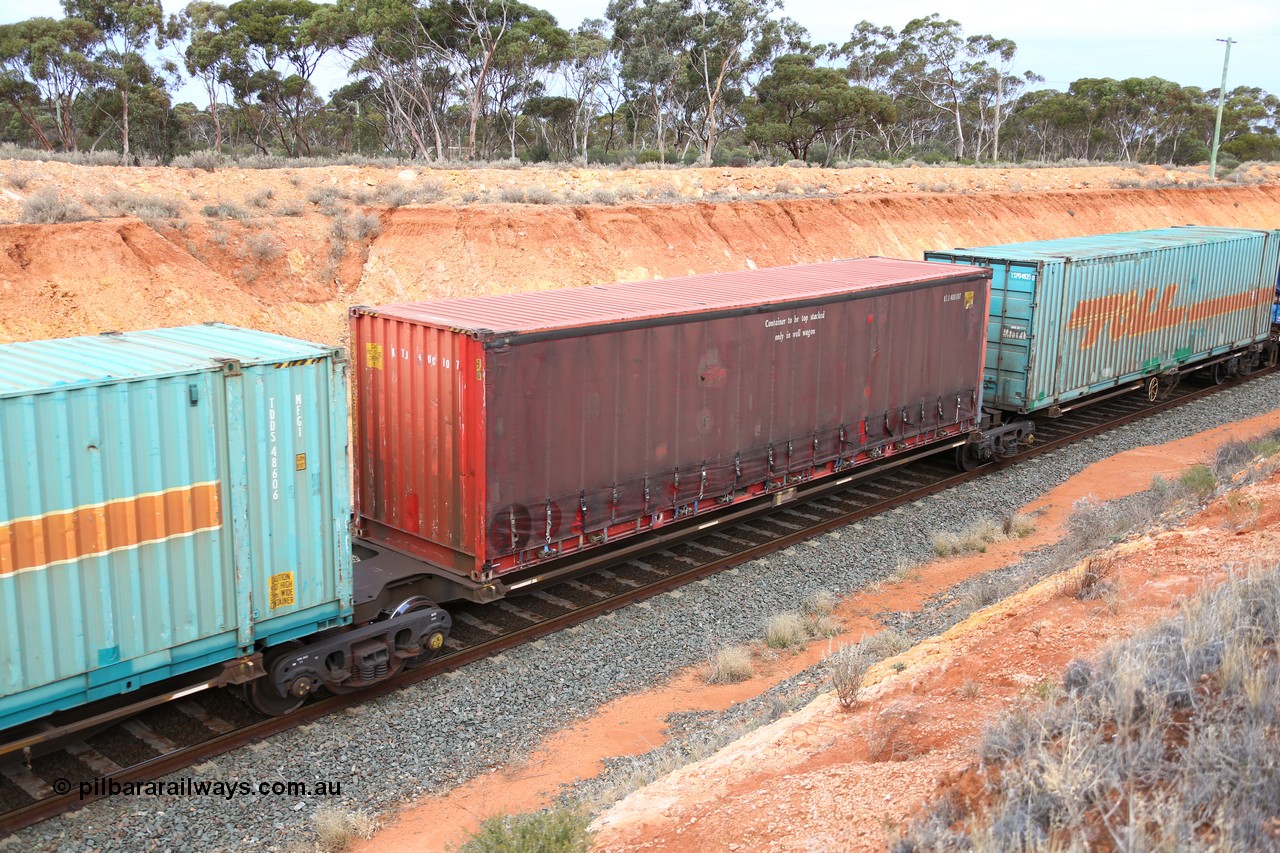 160524 3754
West Kalgoorlie, 2PM6 intermodal train, RRQY 8313 platform 2 of 5-pack articulated skel waggon, one of forty one sets built by Qiqihar Rollingstock Works China in 2006 loaded with a 40' KTJ red curtainsider KTJ 400107.
Keywords: RRQY-type;RRQY8313;Qiqihar-Rollingstock-Works-China;