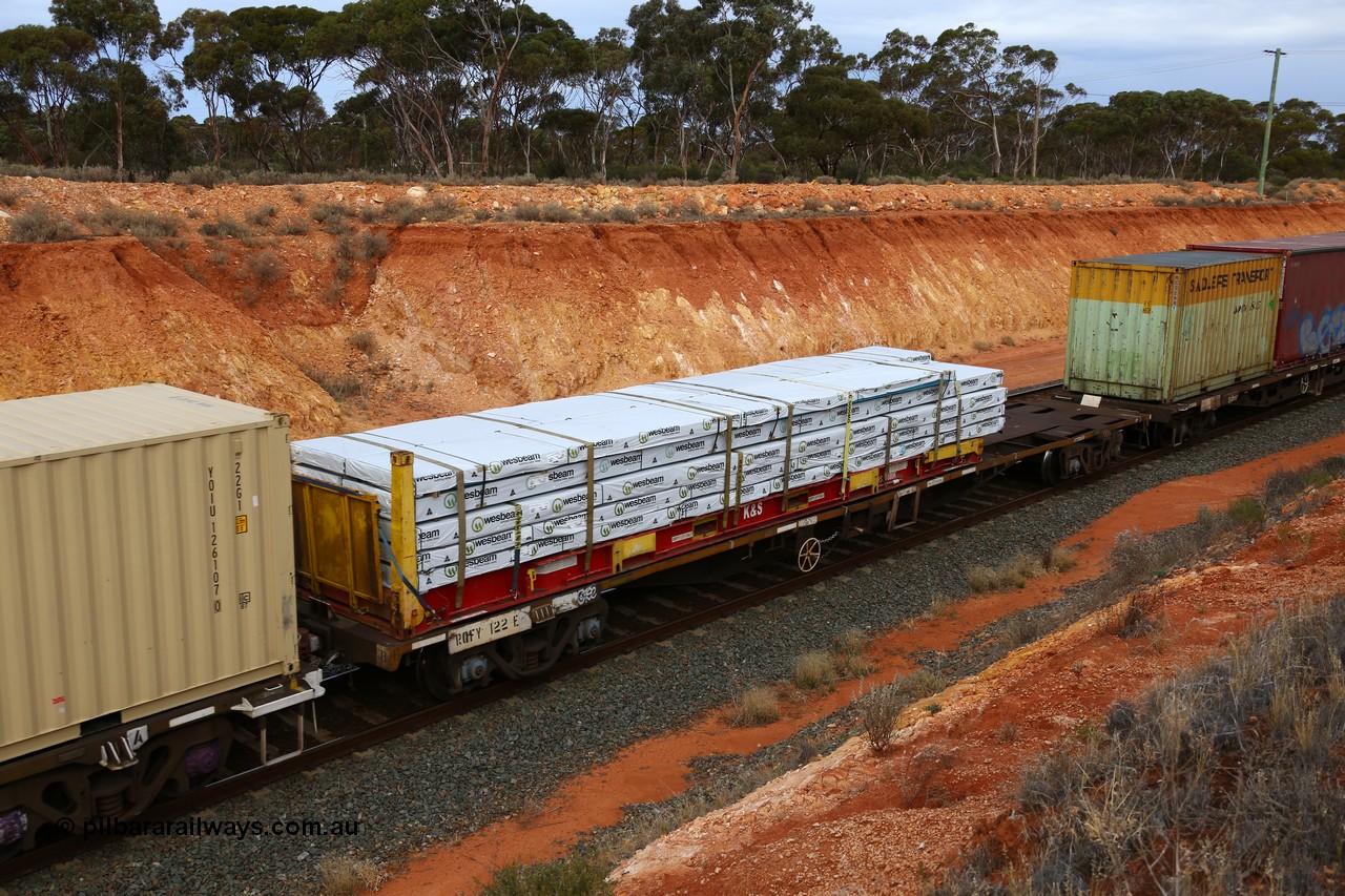 160524 3757
West Kalgoorlie, 2PM6 intermodal train, RQFY 122 container waggon, built by Victorian Railways Bendigo Workshops in 1980 as a batch of seventy five VQFX type skeletal container waggons, recoded in April 1994 RQFY and 2CM bogies fitted August 1995. K+S 40' flatrack loaded over length with Wesbeam proucts.
Keywords: RQFY-type;RQFY122;Victorian-Railways-Bendigo-WS;VQFX-type;RQFF-type;