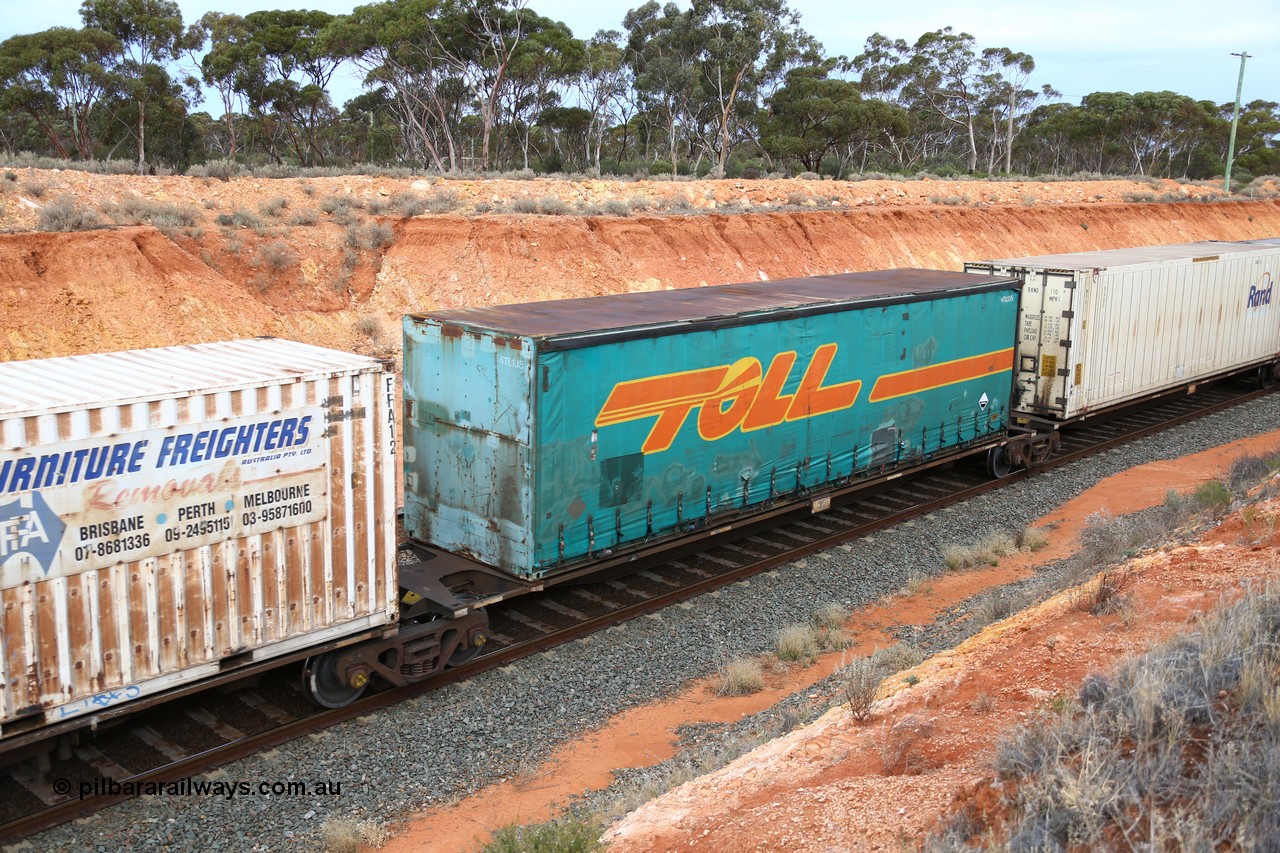 160524 3760
West Kalgoorlie, 2PM6 intermodal train, 48' platform of RRGY 7130 5-pack articulated skel waggon, one of fifty built by AN Rail Islington Workshops in 1996-97 as type RRBY, later rebuilt with 48' intermediate decks and coded RRGY, Toll 40' curtainsider 4TL135.
Keywords: RRGY-type;RRGY7130;AN-Islington-WS;RRBY-type;