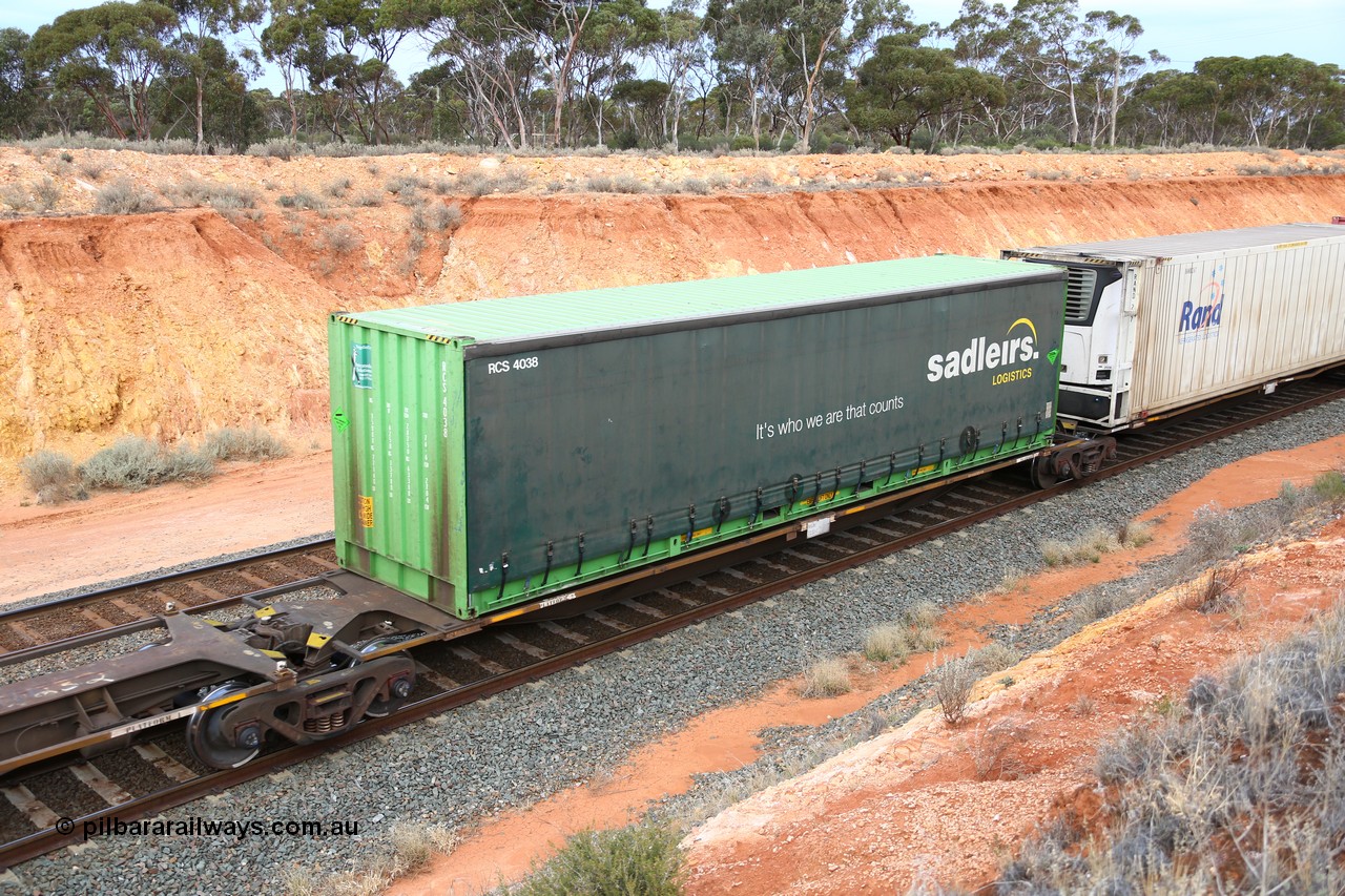 160524 3765
West Kalgoorlie, 2PM6 intermodal train, RRAY 7232 platform 2 of 5-pack articulated skel waggon set, one of 100 built by ABB Engineering NSW 1996-2000, with a 40' Sadleirs curtainsider RCS 4038.
Keywords: RRAY-type;RRAY7232;ABB-Engineering-NSW;