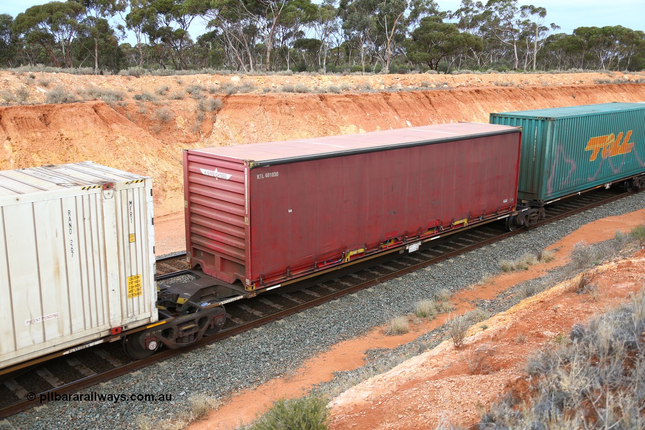 160524 3767
West Kalgoorlie, 2PM6 intermodal train, RRAY 7232 platform 4 of 5-pack articulated skel waggon set, one of 100 built by ABB Engineering NSW 1996-2000, with a 40' K+S Freighters curtainsider KTL 401030.
Keywords: RRAY-type;RRAY7232;ABB-Engineering-NSW;