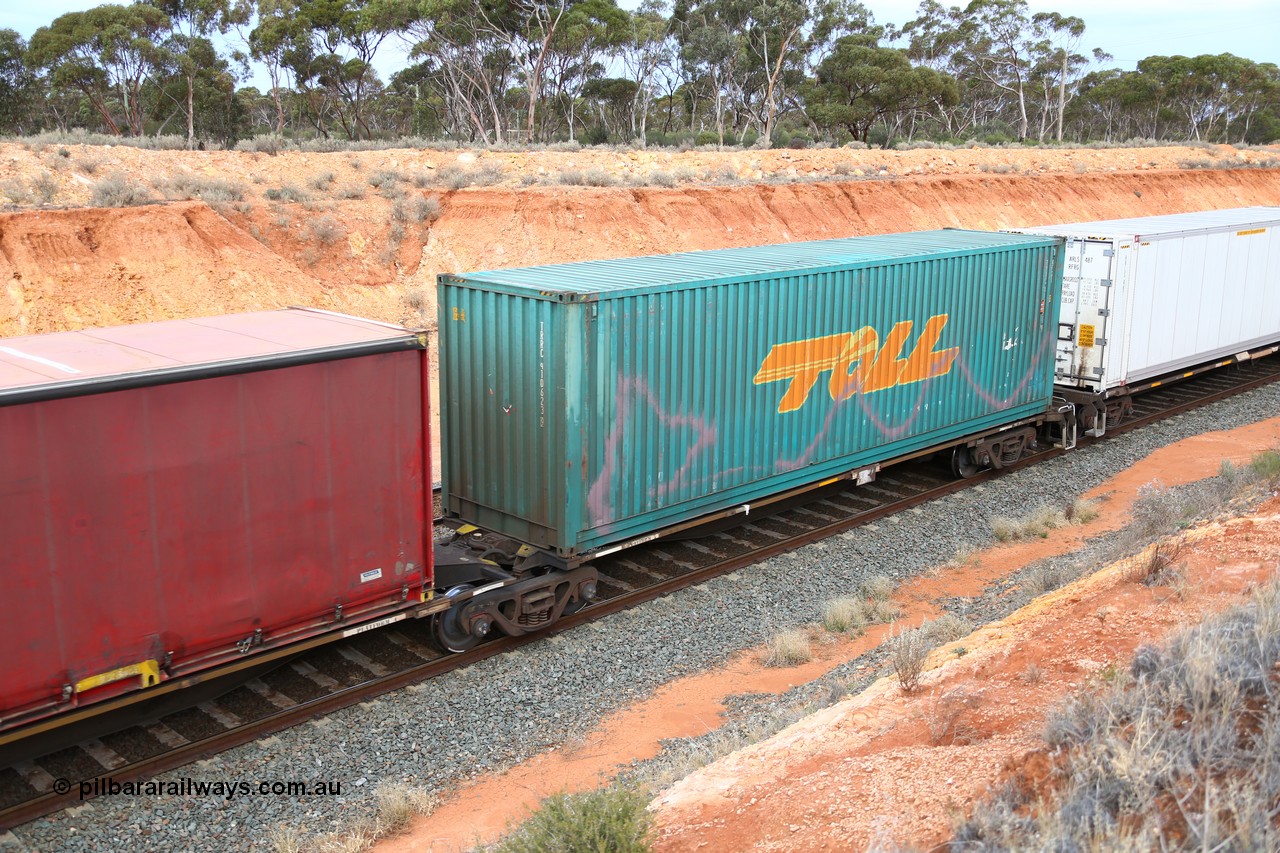 160524 3768
West Kalgoorlie, 2PM6 intermodal train, RRAY 7232 platform 5 of 5-pack articulated skel waggon set, one of 100 built by ABB Engineering NSW 1996-2000, with a 40' Toll box TRRC 410623.
Keywords: RRAY-type;RRAY7232;ABB-Engineering-NSW;