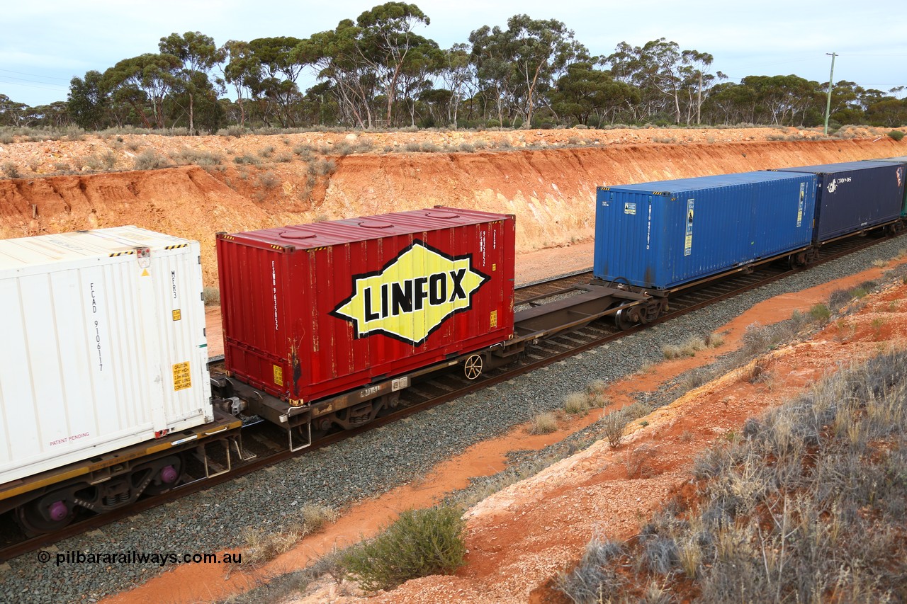 160524 3775
West Kalgoorlie, 2PM6 intermodal train, RQLY 4 platform 5 of 5-pack articulated skeletal waggon set, 1 of 8 built by AN Rail Islington Workshops in 1987 as AQJY, Linfox 20' 2EG9 type box with roof hatches FSWB 9635052 and an empty slot.
Keywords: RQJY-type;RQJY4;AN-Islington-WS;AQJY-type;