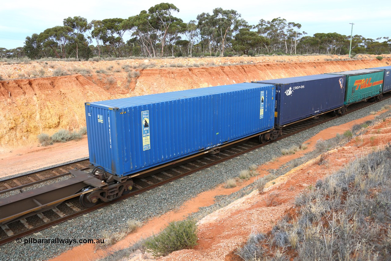 160524 3776
West Kalgoorlie, 2PM6 intermodal train, RQLY 4 platform 4 of 5-pack articulated skeletal waggon set, 1 of 8 built by AN Rail Islington Workshops in 1987 as AQJY, Royal Wolf 40' 4EG1 type box RWTU 941207[2].
Keywords: RQJY-type;RQJY4;AN-Islington-WS;AQJY-type;