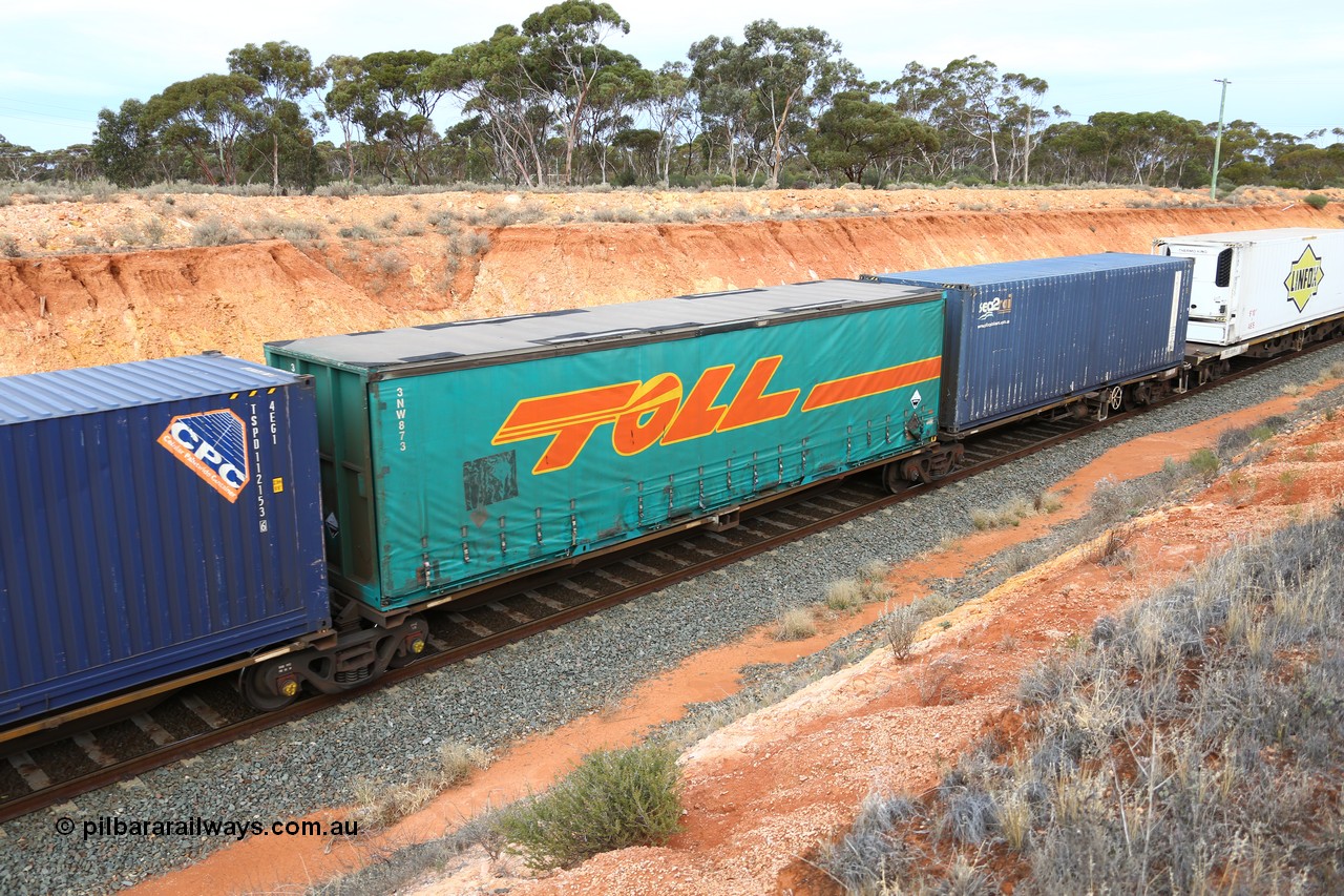 160524 3778
West Kalgoorlie, 2PM6 intermodal train, RQLY 4 platform 2 of 5-pack articulated skeletal waggon set, 1 of 8 built by AN Rail Islington Workshops in 1987 as AQJY, Toll 40' curtainsider 3NW 873.
Keywords: RQJY-type;RQJY4;AN-Islington-WS;AQJY-type;