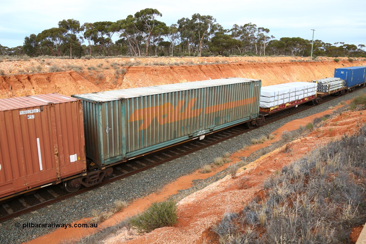 160524 3784
West Kalgoorlie, 2PM6 intermodal train, RRGY 7144 platform 3 of 5-pack articulated skeletal waggon set, one of fifty originally built by AN Rail Islington Workshops in 1996-97 as type RRBY, later rebuilt with 48' intermediate decks and recoded to RRGY, Toll 48' box TERF 48071.
Keywords: RRGY-type;RRGY7144;AN-Islington-WS;RRBY-type;