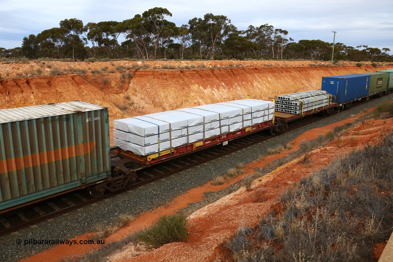 160524 3785
West Kalgoorlie, 2PM6 intermodal train, RRGY 7144 platform 4 of 5-pack articulated skeletal waggon set, one of fifty originally built by AN Rail Islington Workshops in 1996-97 as type RRBY, later rebuilt with 48' intermediate decks and recoded to RRGY, K+S 40' flatrack KHS 400628 with Wesbeam products.
Keywords: RRGY-type;RRGY7144;AN-Islington-WS;RRBY-type;