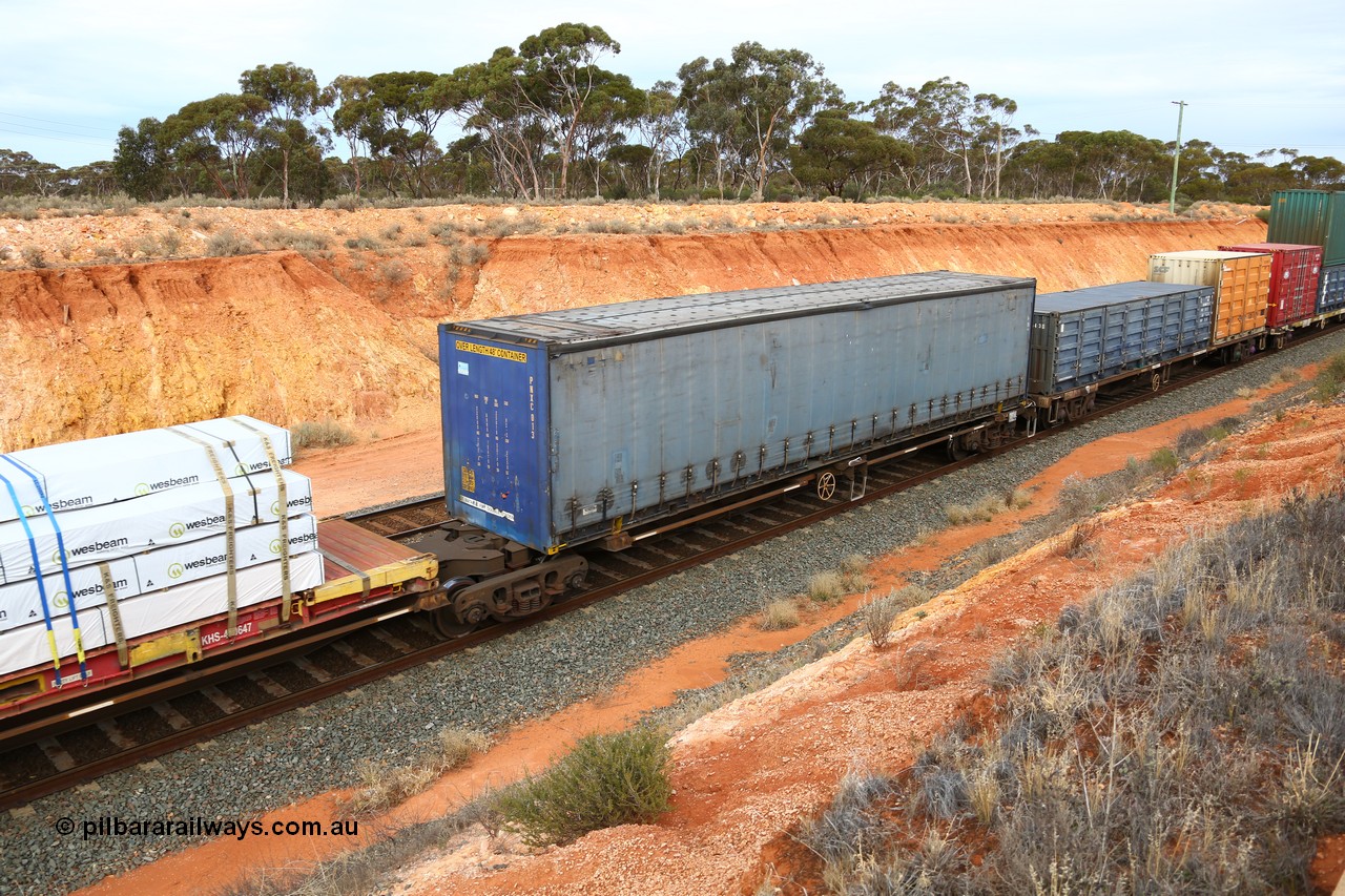 160524 3792
West Kalgoorlie, 2PM6 intermodal train, RRQY 8314 platform 5 of articulated five-unit container waggon set built by Qiqihar Rollingstock Works in China as part of a forty one unit order in 2005/06, Pacific National 48' curtainsider PNXC 013.
Keywords: RRQY-type;RRQY8314;Qiqihar-Rollingstock-Works-China;