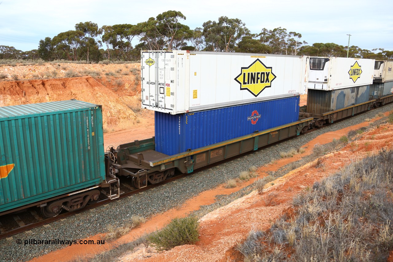 160524 3800
West Kalgoorlie, 2PM6 intermodal train, RRXY 8 platform 5 of 5-pack well waggon set, one of eleven built by Bradken Qld in 2002 for Toll from a Williams-Worley design with a 40' Railroad Transport box RTPH 4033 in the well and a Linfox 46' 6