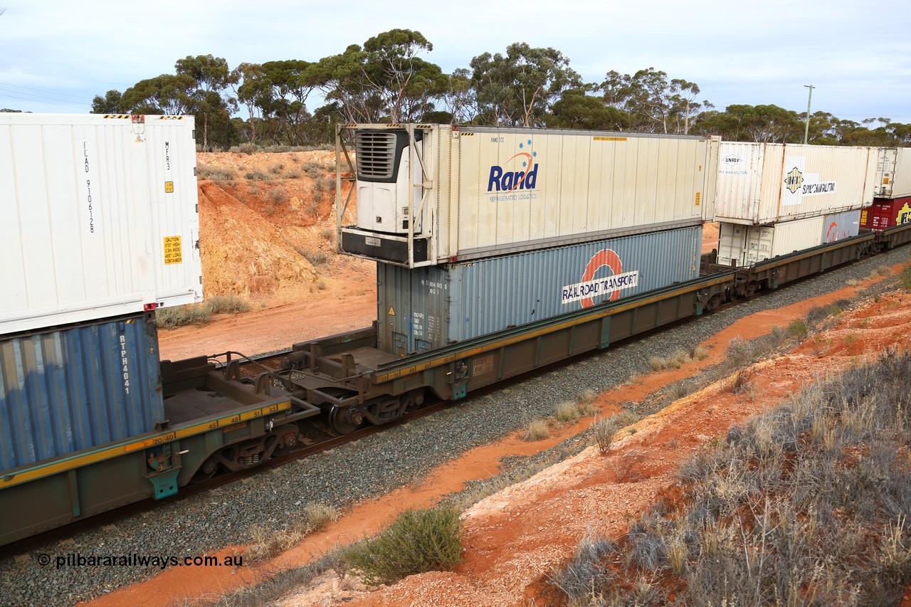 160524 3802
West Kalgoorlie, 2PM6 intermodal train, RRXY 8 platform 3 of 5-pack well waggon set, one of eleven built by Bradken Qld in 2002 for Toll from a Williams-Worley design with a 40' Railroad Transport box RRTU 004063 in the well and a RAND Refrigerated Logistics 46' 6