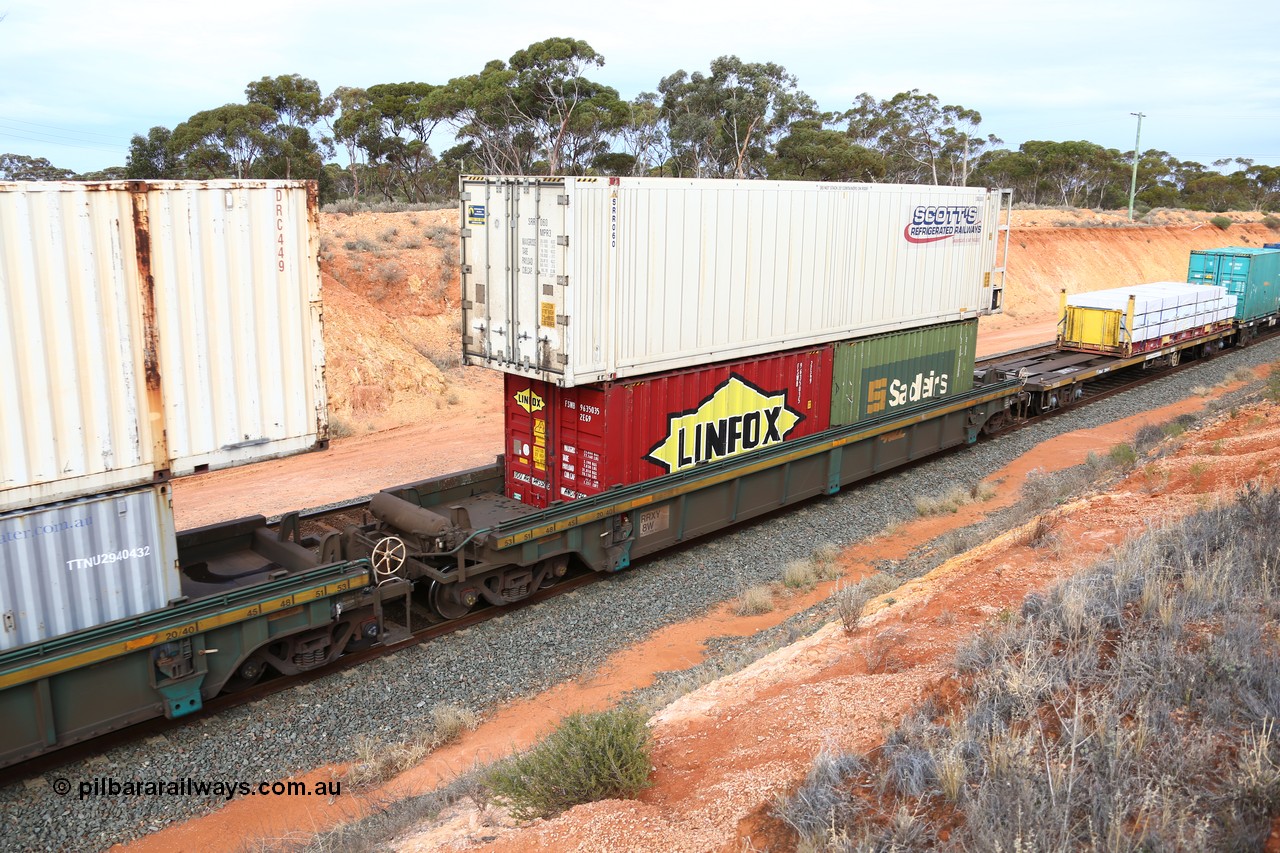 160524 3804
West Kalgoorlie, 2PM6 intermodal train, RRXY 8 platform 1 of 5-pack well waggon set, one of eleven built by Bradken Qld in 2002 for Toll from a Williams-Worley design with 20' Linfox 2EG9 type FSWB 963503 and a Sadleirs 2EB0 type box RCS? 6063? in the well and Scott's Refrigerated Railways 46' 6