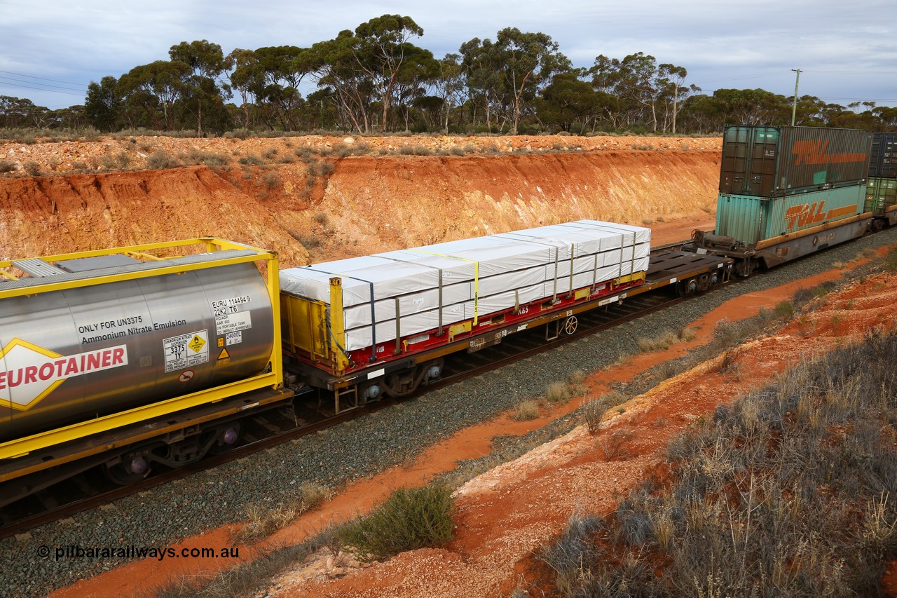 160524 3811
West Kalgoorlie, 2PM6 intermodal train, RQAY 21894 container waggon, one of a hundred waggons built in 1981 by EPT NSW as type NQAY, recoded to RQAY in 1994. Loaded with a K&S 40' flatrack KHS 400820 with Wesbeam products.
Keywords: RQAY-type;RQAY21894;EPT-NSW;NQAY-type;