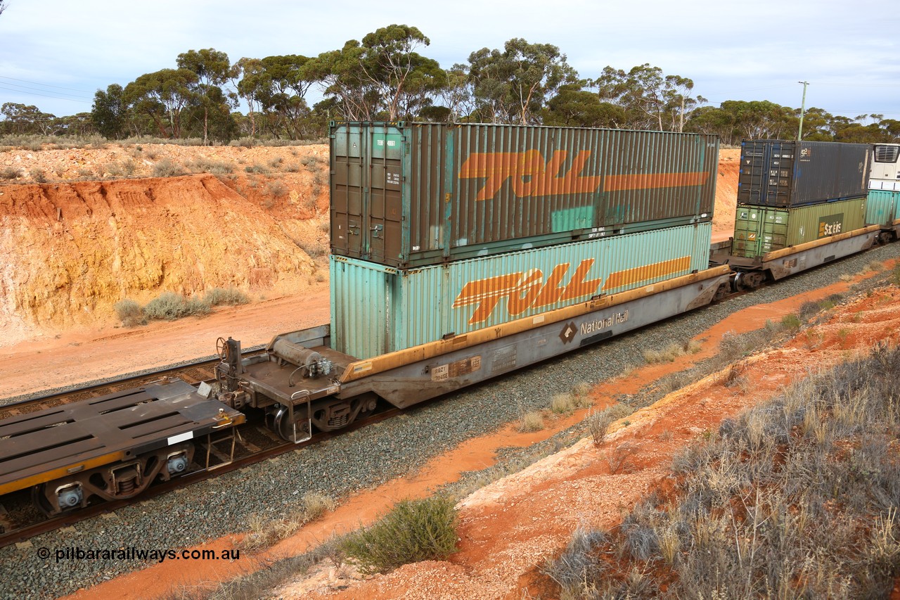 160524 3812
West Kalgoorlie, 2PM6 intermodal train, RQZY 7045 platform 5 of 5-pack well waggon set, one of thirty two sets built by Goninan NSW in 1995-96 for National Rail loaded with two Toll 48' containers MEG1 type TCML 48595 and TERF 48061 ex Macfield.
Keywords: RQZY-type;RQZY7045;Goninan-NSW;