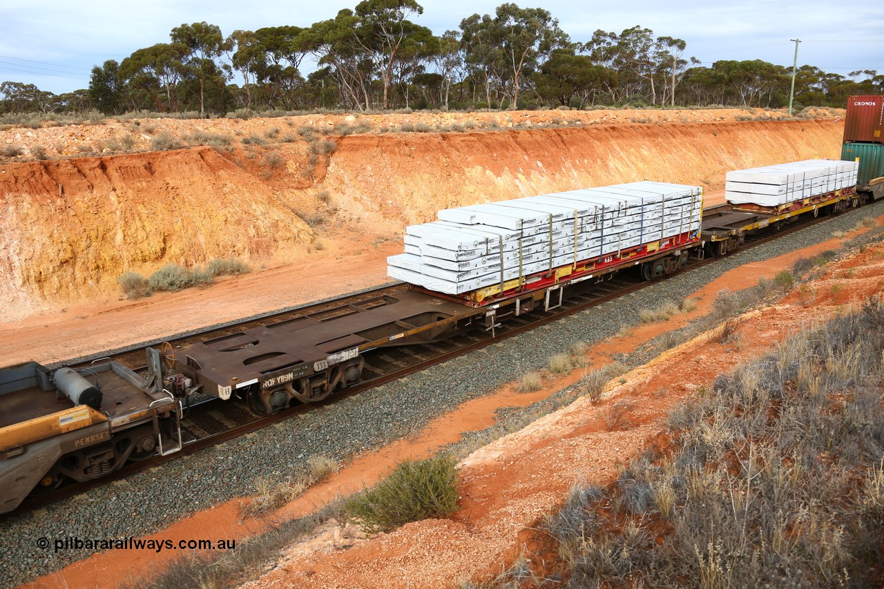 160524 3817
West Kalgoorlie, 2PM6 intermodal train, RQFY 119 container waggon, built by Victorian Railways Bendigo Workshops in 1980 as a batch of seventy five VQFX type skeletal container waggons, recoded to VQFY in 1985, recoded in April 1994 RQFY, May 1995 to RQFF and 2CM bogies fitted August 1995. 40' K+S flatrack KHS 400725 loaded with Wesbeam proucts.
Keywords: RQFY-type;RQFY119;Victorian-Railways-Bendigo-WS;VQFX-type;VQFY-type;RQFF-type;