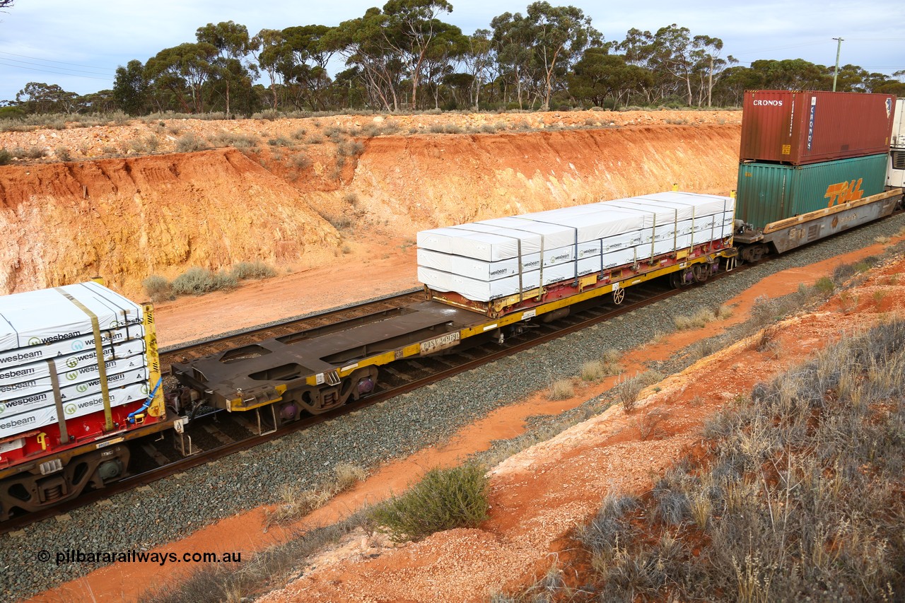 160524 3818
West Kalgoorlie, 2PM6 intermodal train, RQSY 34979 container flat waggon originally built by Goninan NSW in a batch of one hundred OCY type in 1975, recoded to NQOY, the modified to NQSY. Loaded with a K&S 40' flatrack KHS 400635 with Wesbeam timber products.
Keywords: RQSY-type;RQSY34979;Goninan-NSW;OCY-type;NQOY-type;NQSY-type;