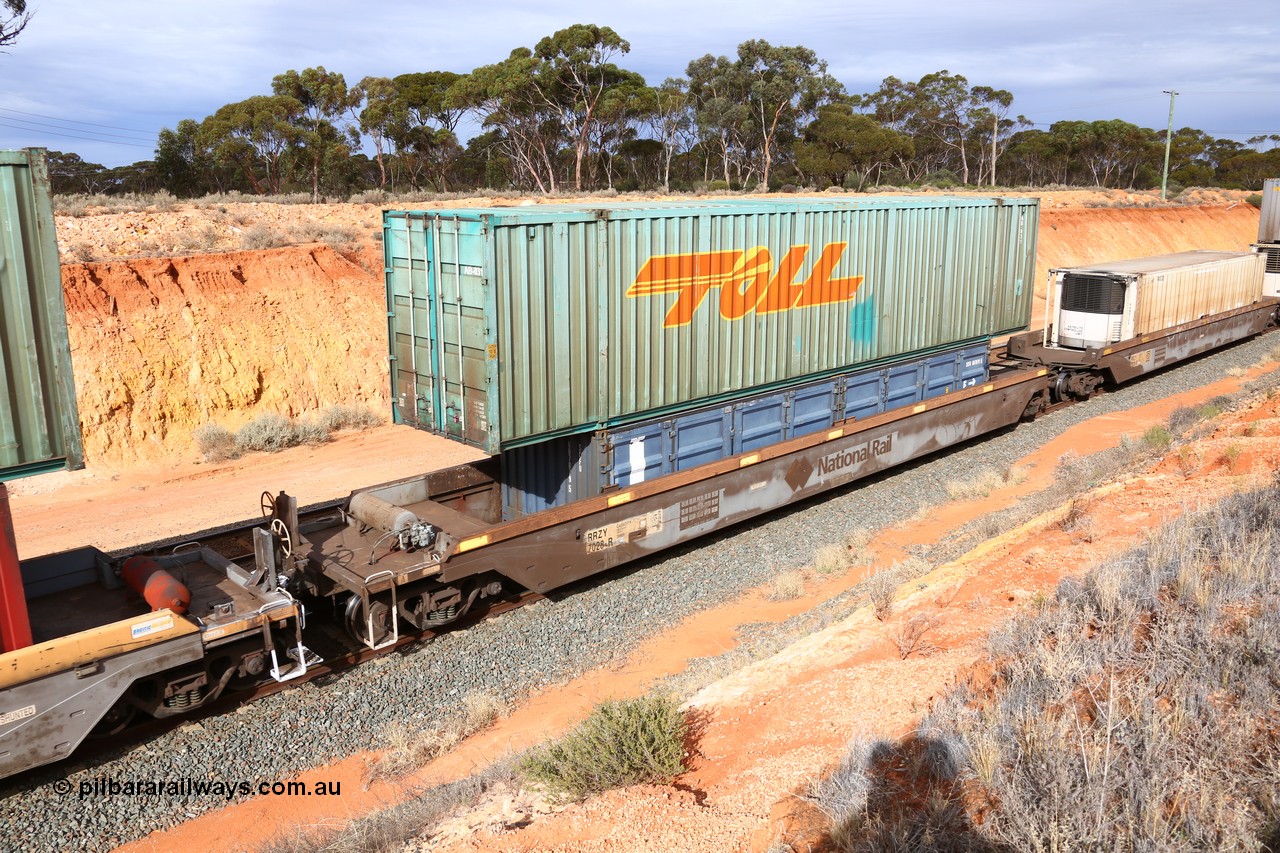 160524 3824
West Kalgoorlie, 2PM6 intermodal train, RRZY type five unit bar coupled well container waggon set RRZY 7028 platform 1, originally built by Goninan in a batch of twenty six as RQZY type for National Rail, recoded when repaired. Loaded with an SCF 40' half height side door container SCFU 607079[5] double stacked with Toll 53' car container AB 031.
Keywords: RRZY-type;RRZY7028;Goninan-NSW;RQZY7-type;