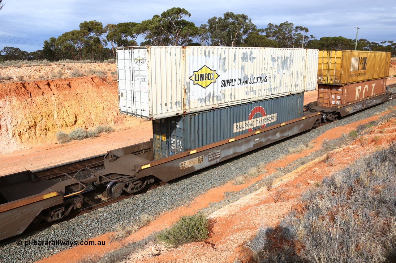 160524 3827
West Kalgoorlie, 2PM6 intermodal train, RRZY type five unit bar coupled well container waggon set RRZY 7028 platform 4, originally built by Goninan in a batch of twenty six as RQZY type for National Rail, recoded when repaired. Loaded with a Railroad Transport 40 4EG1 type container RTPU 4021 double stacked with Linfox 53' car container DRC 371.
Keywords: RRZY-type;RRZY7028;Goninan-NSW;RQZY7-type;