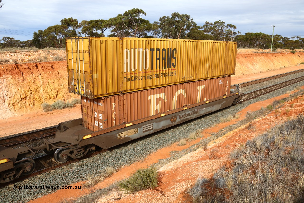 160524 3828
West Kalgoorlie, 2PM6 intermodal train, RRZY type five unit bar coupled well container waggon set RRZY 7028 platform 5, originally built by Goninan in a batch of twenty six as RQZY type for National Rail, recoded when repaired. Loaded with a 48' FCL container FBGU 480327[5] double stacked with Autotrans 53' car container AB 036.
Keywords: RRZY-type;RRZY7028;Goninan-NSW;RQZY7-type;