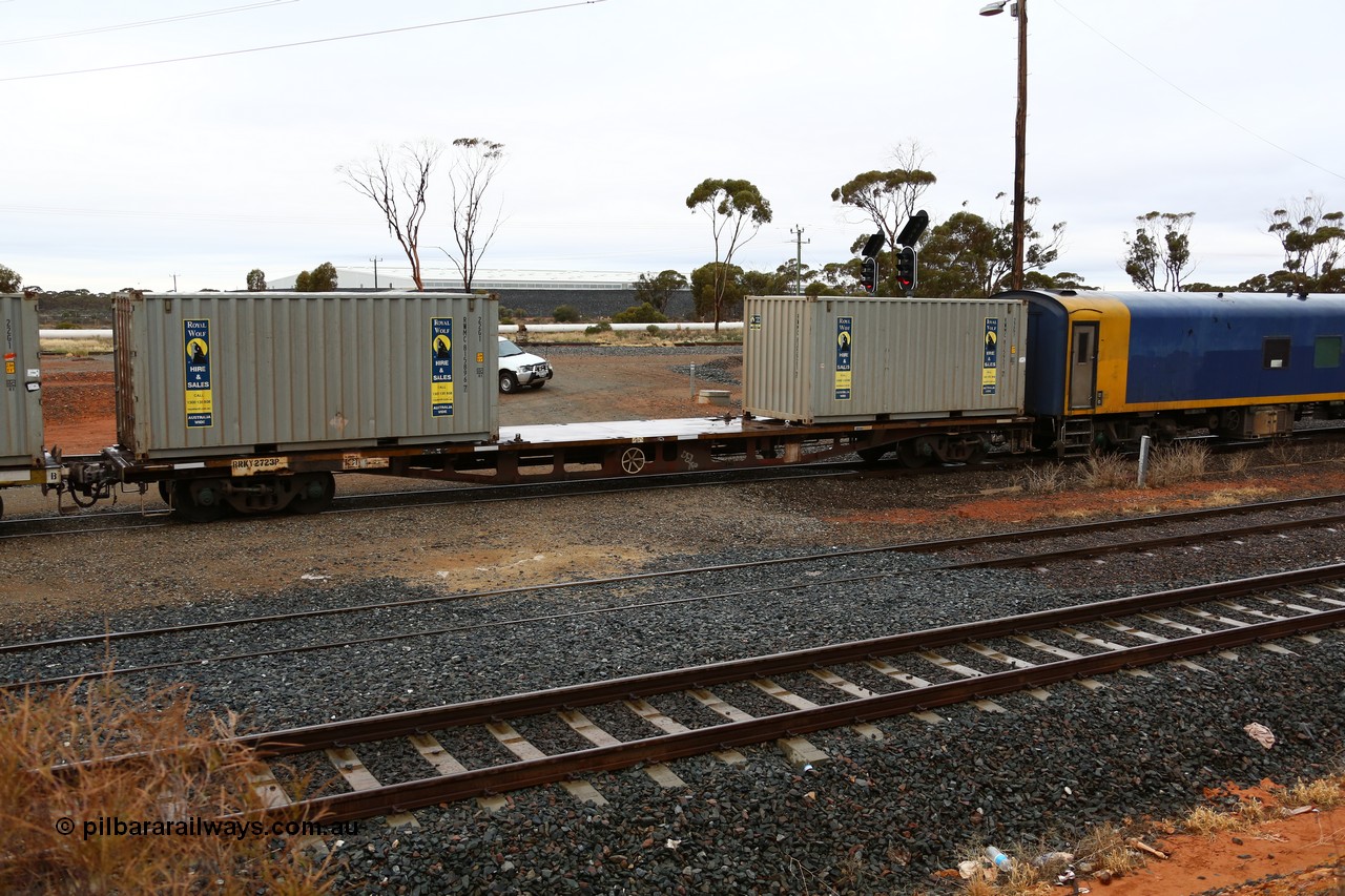 160524 4243
West Kalgoorlie, 1MP2 steel train, RRKY 2723, originally built by Perry Engineering SA in 1974 part of a batch of forty five RM type motor vehicle flat waggons, recoded to AQPY container waggon, then AQMP and RQKY, riding on aligned bogies, loaded with two Royal Wolf 20' 22G1 type boxes RWMC 815896 and 815921.
Keywords: RRKY-type;RRKY2723;Perry-Engineering-SA;RM-type;AQPY-type;AQMP-type;RQKY-type;