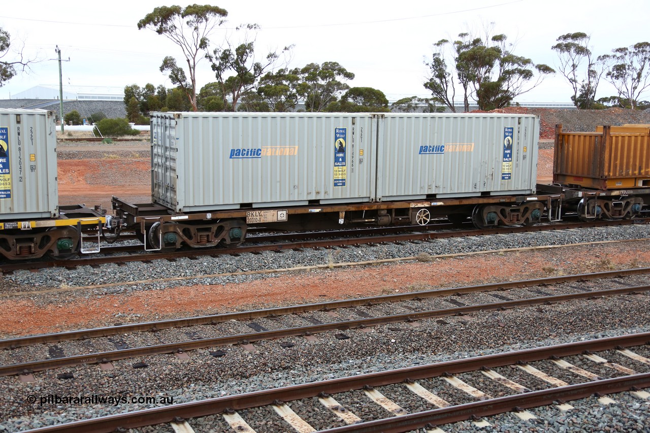 160524 4294
West Kalgoorlie, 1MP2 steel train, RKLY 20310, totally unrecognisable from original build by EPT NSW 1979-81 as part of a batch of two hundred BDY type 14.20 metre open waggons, had several recoding's prior to its current guise, loaded with two Royal Wolf 22G1 type 20' boxes RWLU 814966 and RWLU 814909.
Keywords: RKLY-type;RKLY20310;BDY-type;NODY-type;NKDY-type;RKDY-type;RKCY-type;