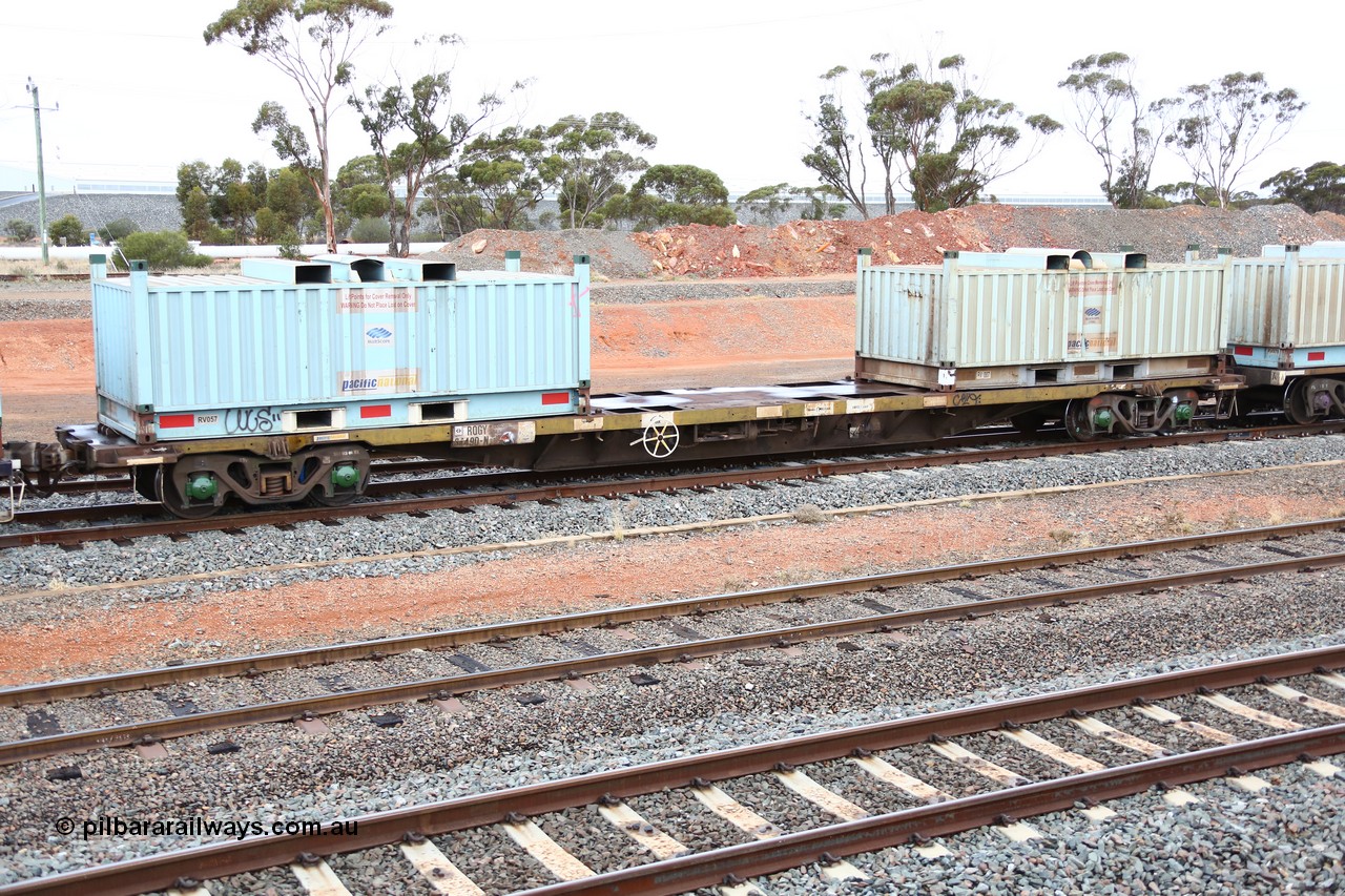 160524 4297
West Kalgoorlie, 1MP2 steel train, RQGY 34490 originally built by Tulloch Ltd NSW as part of a batch of one hundred OCY type 19.20 metre container waggons, recoded to NQOY and NQGY, seen here loaded with two RV type coil or 'butter box' containers RV 057 and RV 007.
Keywords: RQGY-type;RQGY34490;Tulloch-Ltd-NSW;OCY-type;NQOY-type;NQGY-type;