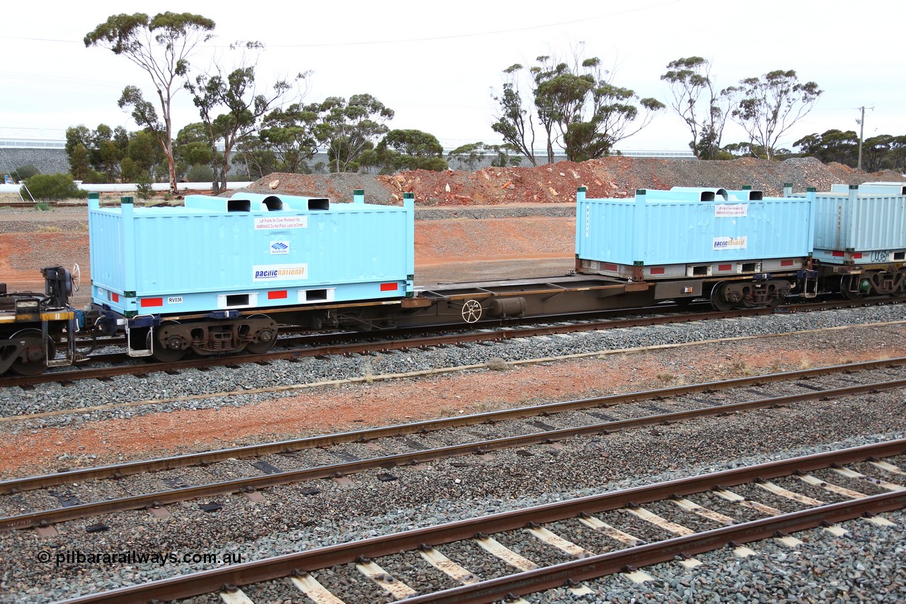 160524 4298
West Kalgoorlie, 1MP2 steel train, RQHY 7014 built new for Pacific National 2005-05 by Qiqihar Rollingstock Works China in a batch of seventy eight units 19.40 metre container waggons. Loaded with two RV type coil steel carrying containers or 'butter boxes' RV 036 and RV 035.
Keywords: RQHY-type;RQHY7014;Qiqihar-Rollingstock-Works-China;