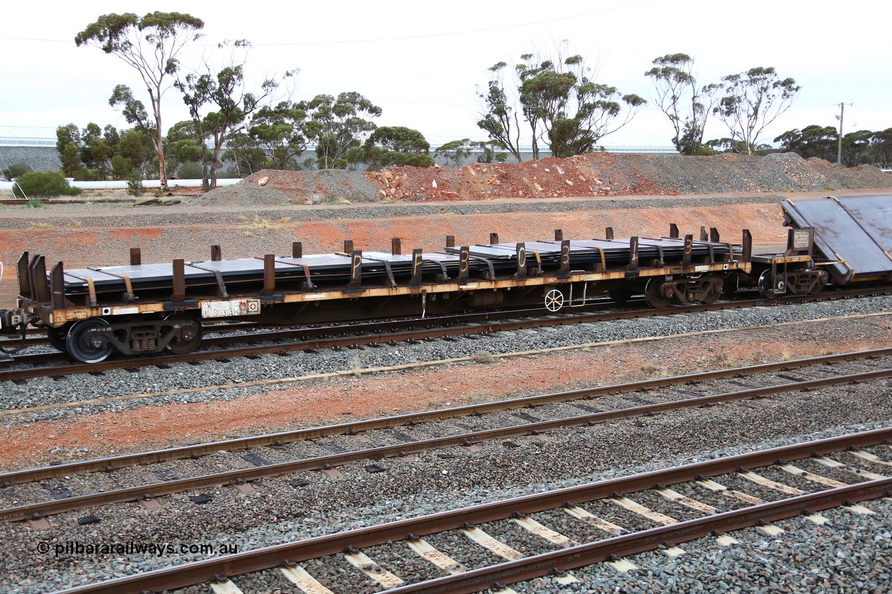 160524 4300
West Kalgoorlie, 1MP2 steel train, RKPF 30313 originally built by NSWGR Chullora Workshops as part of a batch of twenty CPX type flat waggons, converted to NKPX type ~1991 to carry large steel plate, loaded with a variety of same.
Keywords: RKPF-type;RKPF30313;NSWGR-Chullora-WS;CPX-type;NFPX-type;