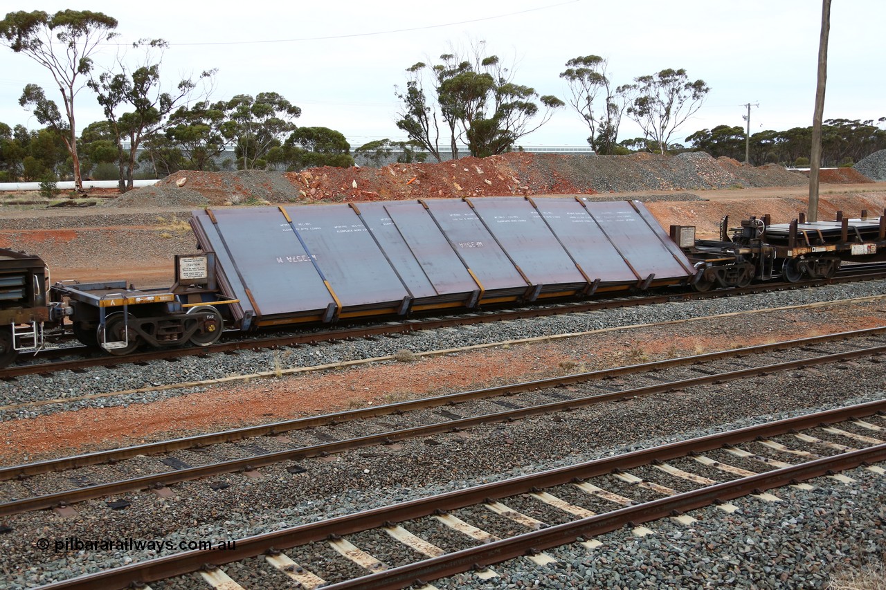 160524 4301
West Kalgoorlie, 1MP2 steel train, RKYY type wide steel plate tilt waggon RKYY 7084 the first of twenty seven units built by AN Rail Islington Workshops in 1995-96. Loaded with steel plate.
Keywords: RKYY-type;RKYY7084;AN-Islington-WS;