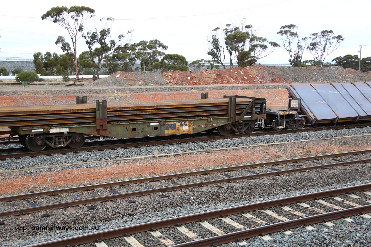 160524 4302
West Kalgoorlie, 1MP2 steel train, RKAX 6, 2-pack rail transport waggon, Platform 2, this waggon was converted by Port Augusta Workshops from two original FBX type waggons built in 1968-69 by Islington Workshops in a batch of twenty later coded AFCX. AKAX 6 and AKCX 14 where the donors for this waggon. Loaded with a full load of rail strings.
Keywords: RKAX-type;RKAX6;SAR-Islington-WS;FBX-type;