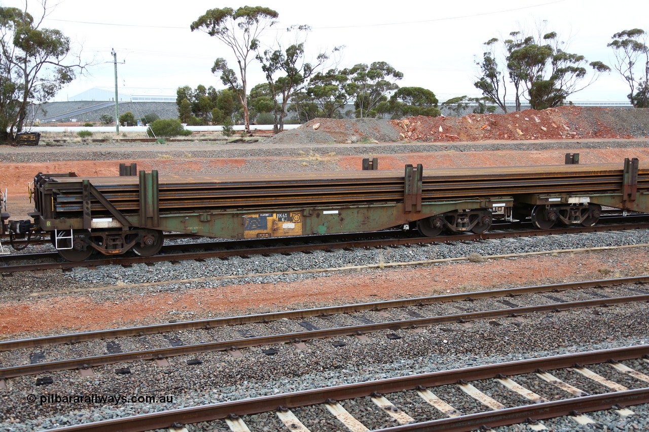 160524 4303
West Kalgoorlie, 1MP2 steel train, RKAX 6, 2-pack rail transport waggon, Platform 1, this waggon was converted by Port Augusta Workshops from two original FBX type waggons built in 1968-69 by Islington Workshops in a batch of twenty later coded AFCX. AKAX 6 and AKCX 14 where the donors for this waggon. Loaded with a full load of rail strings.
Keywords: RKAX-type;RKAX6;SAR-Islington-WS;FBX-type;
