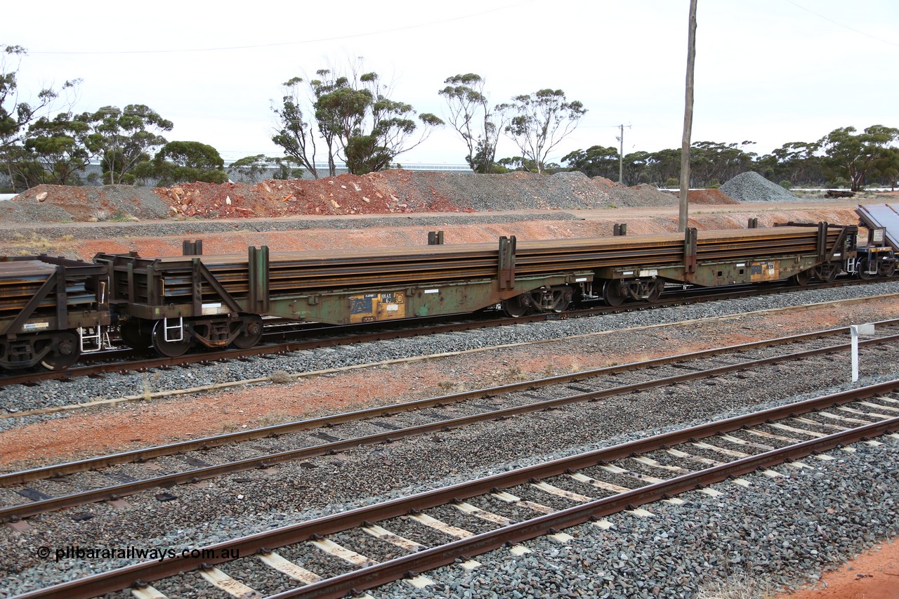 160524 4304
West Kalgoorlie, 1MP2 steel train, RKAX 6, 2-pack rail transport waggon, this waggon was converted by Port Augusta Workshops from two original FBX type waggons built in 1968-69 by Islington Workshops in a batch of twenty later coded AFCX. AKAX 6 and AKCX 14 where the donors for this waggon. Loaded with a full load of rail strings.
Keywords: RKAX-type;RKAX6;SAR-Islington-WS;FBX-type;