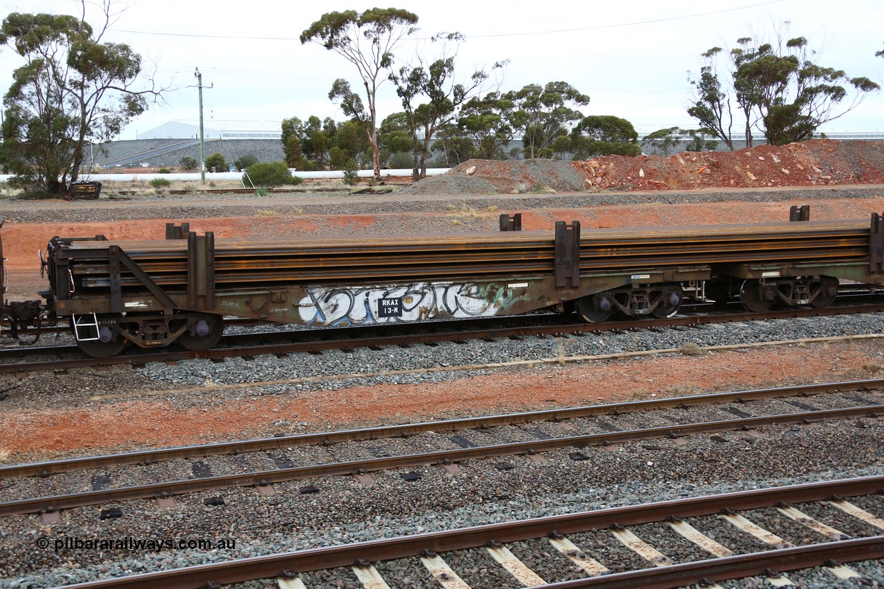 160524 4306
West Kalgoorlie, 1MP2 steel train, RKAX 13, 2-pack rail transport waggon, Platform 1, this waggon was converted by Port Augusta Workshops from two original FBX type waggons built in 1968-69 by Islington Workshops in a batch of twenty later coded AFCX. AFCX 13 & AKAX 5 where the donors for this waggon. Loaded with a full load of rail strings.
Keywords: RKAX-type;RKAX13;SAR-Islington-WS;FBX-type;