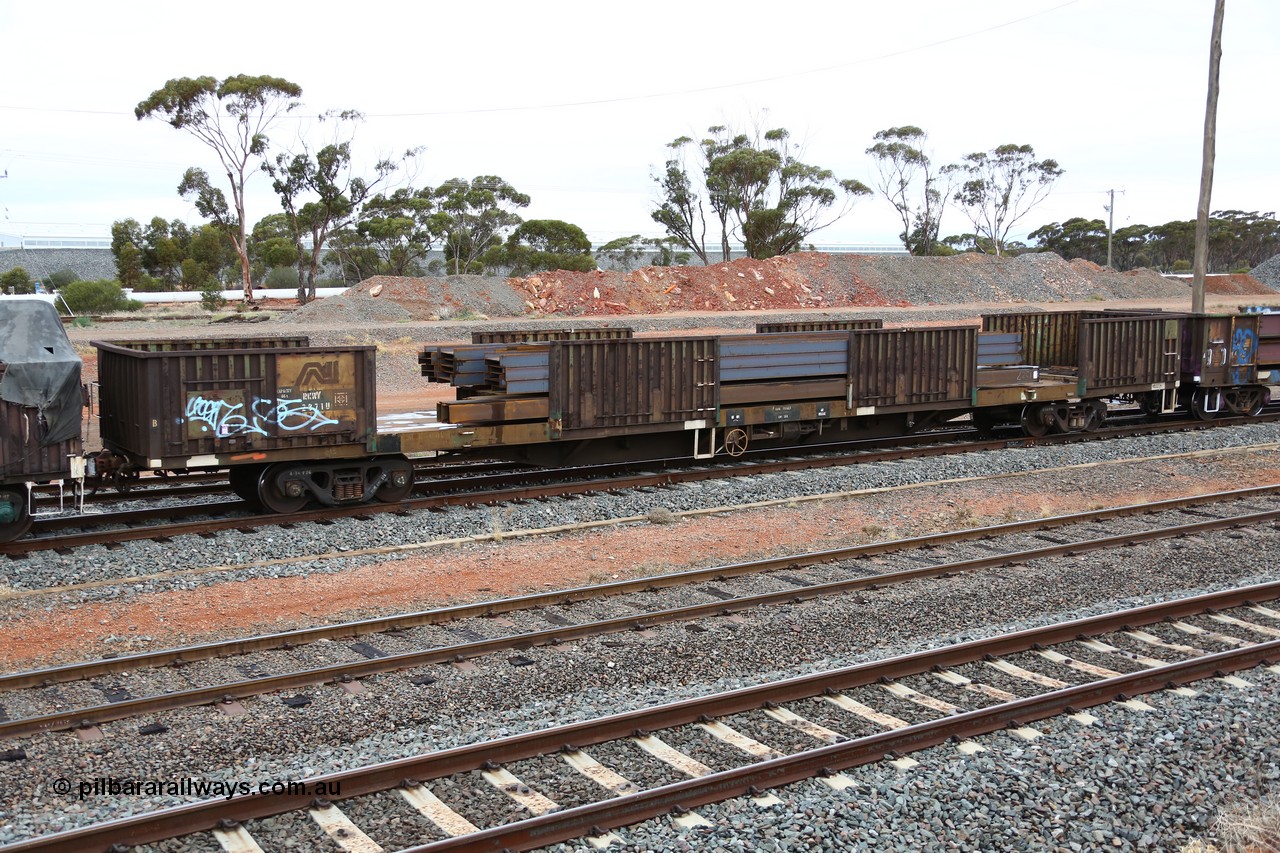160524 4311
West Kalgoorlie, 1MP2 steel train, RKWY 2871, originally built by Transfield WA as part of a batch of two hundred GOX type waggons in 1975, recoded to AOOX, later converted to steel traffic. Loaded with long products.
Keywords: RKWY-type;RKWY2871;Transfield-WS;GOX-type;AOOX-type;AKOX-type;