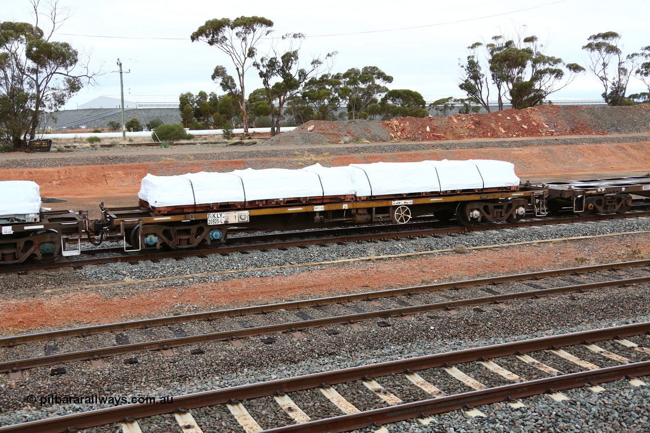 160524 4315
West Kalgoorlie, 1MP2 steel train, container waggon RKLY 20925 with a couple of plastic wrapped flatrack units. Originally built in the third contract of two hundred NODY type open waggons built by EPT NSW in 1980/81. Several recodes later it is fitted for containers, primarily steel traffic.
Keywords: RKLY-type;RKLY20925;EPT-NSW;NODY-type;