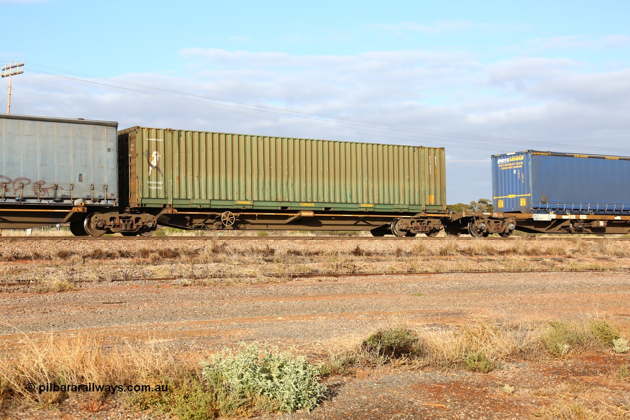 160525 4457
Parkeston, 3PM7 priority service train, RRQY 8408 platform 5 of 5-pack articulated skel waggon, one of thirty four sets built by Qiqihar Rollingstock Works China in 2012, 48' deck with a Intermodal Solutions 48' box RCS 4832.
Keywords: RRQY-type;RRQY8408;Qiqihar-Rollingstock-Works-China;