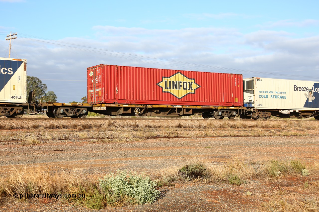 160525 4465
Parkeston, 3PM7 priority service train, RQCY 923 container waggon one of one hundred built by Victorian Railways Bendigo Workshops 1977 as FQX, then VQCX, Linfox 48' box DRC 609.
Keywords: RQCY-type;RQCY923;Victorian-Railways-Bendigo-WS;FQX-type;VQCX-type;RQCX-type;