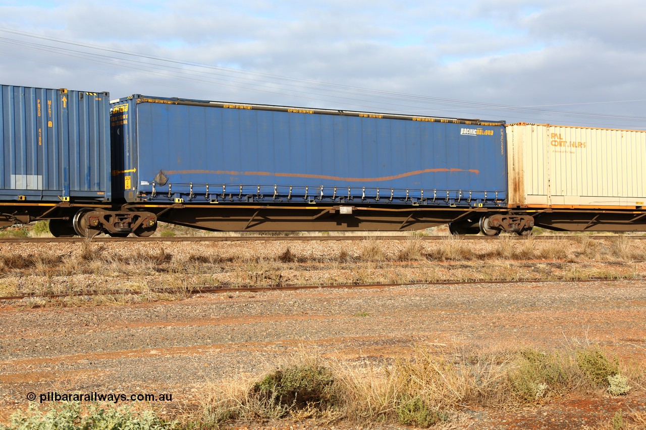 160525 4489
Parkeston, 3PM7 priority service train, RRAY 7203 platform 3 of 5-pack articulated skel waggon set, one of 100 built by ABB Engineering NSW 1996-2000, 48' deck with a Pacific National 48' curtainsider PNXC 5655.
Keywords: RRAY-type;RRAY7203;ABB-Engineering-NSW;