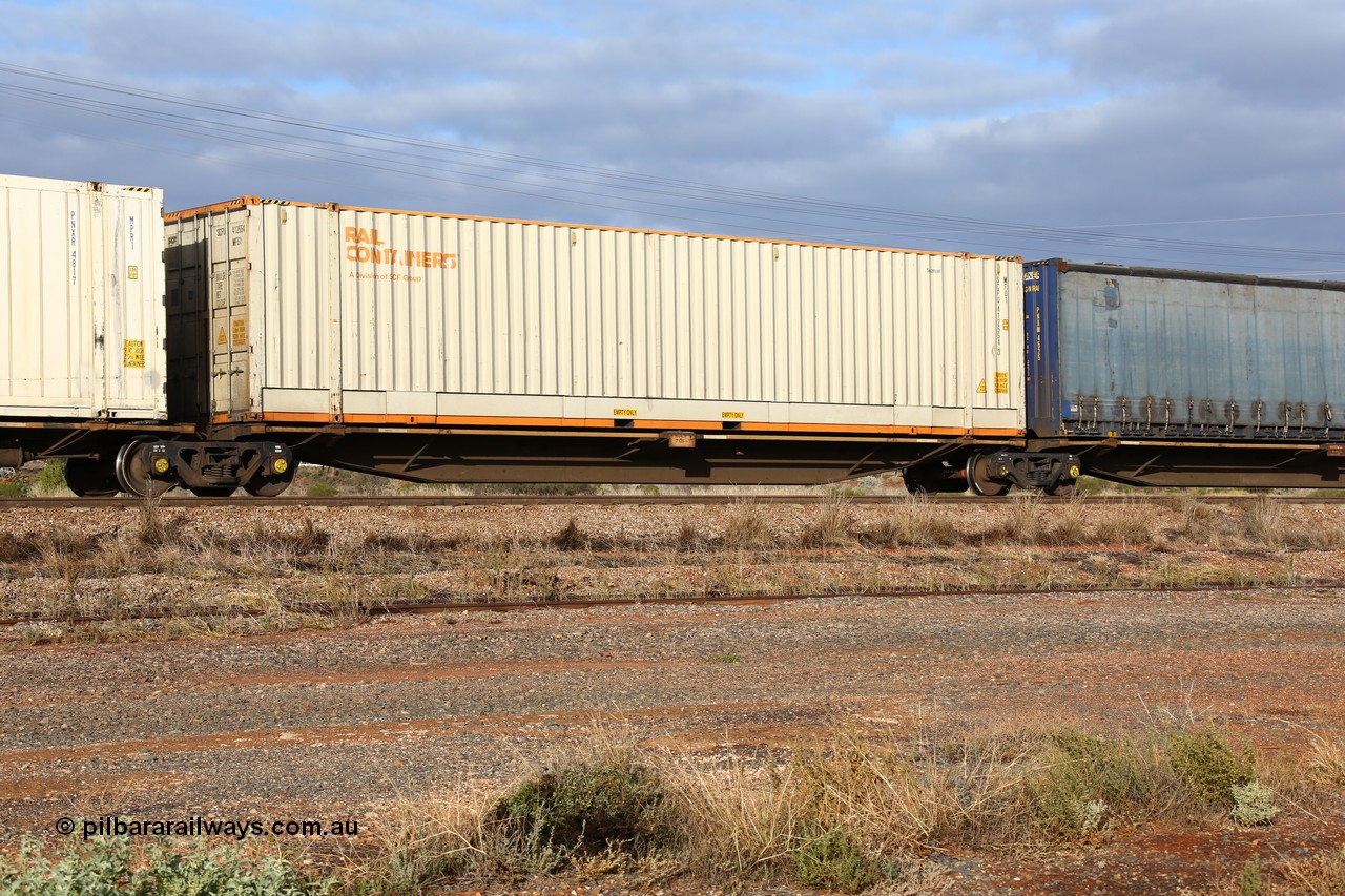 160525 4499
Parkeston, 3PM7 priority service train, RRGY 7129 platform 3 of 5-pack articulated skel waggon, one of fifty originally built by AN Rail Islington Workshops in 1996-97 as type RRBY, later rebuilt with 48' intermediate decks and coded RRGY, 48' deck with Rail Containers sea2rail 48' box SCFU 412554.
Keywords: RRGY-type;RRGY7129;AN-Islington-WS;RRBY-type;