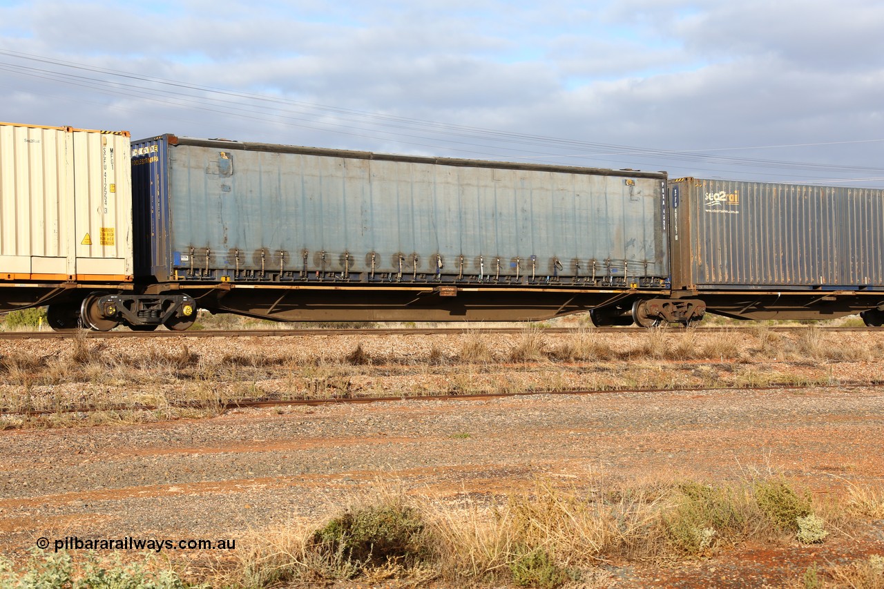 160525 4500
Parkeston, 3PM7 priority service train, RRGY 7129 platform 4 of 5-pack articulated skel waggon, one of fifty originally built by AN Rail Islington Workshops in 1996-97 as type RRBY, later rebuilt with 48' intermediate decks and coded RRGY, 48' deck with a Pacific National 48' curtainsider PNXM 4525.
Keywords: RRGY-type;RRGY7129;AN-Islington-WS;RRBY-type;