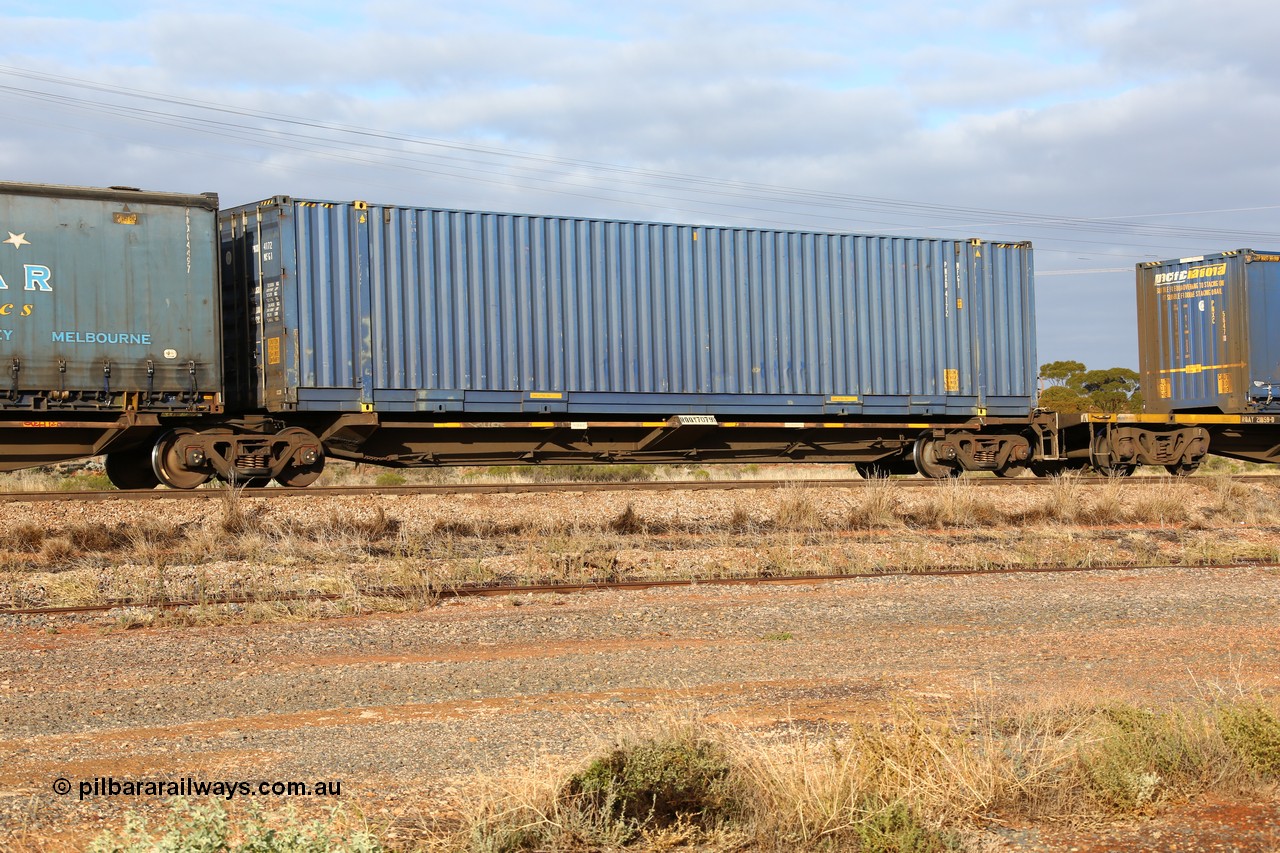 160525 4506
Parkeston, 3PM7 priority service train, RQQY 7079 platform 5 of 5-pack articulated skel waggon set, one of seventeen sets built by Qld Rail at Ipswich Workshops in 1995, 48' plain blue Pacific National box PNXD 4172.
Keywords: RQQY-type;RQQY7079;Qld-Rail-Ipswich-WS;