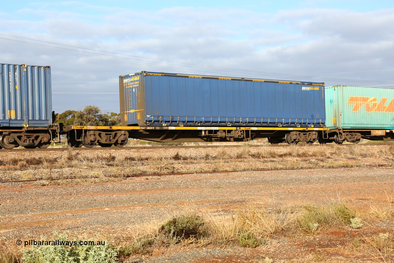 160525 4507
Parkeston, 3PM7 priority service train, RQAY 21859 container waggon, one of a hundred waggons built in 1981 by EPT NSW as type NQAY, recoded to RQAY in 1994. Pacific National 48' curtainsider PNXC 5647.
Keywords: RQAY-type;RQAY21859;EPT-NSW;NQAY-type;