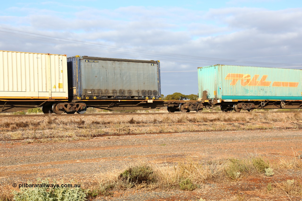 160525 4512
Parkeston, 3PM7 priority service train, RRAY 7255 platform 5 of 5-pack articulated skel waggon set, one of 100 built by ABB Engineering NSW 1996-2000, 40' deck with a 24' Pacific National curtainsider PNXC 4603.
Keywords: RRAY-type;RRAY7255;ABB-Engineering-NSW;
