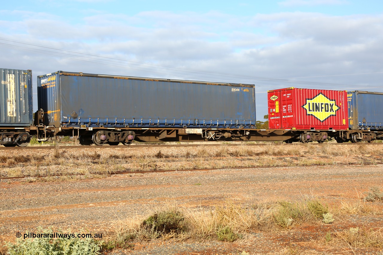 160525 4525
Parkeston, 3PM7 priority service train, RQJW 21957 container waggon, one of twenty five built by Mittagong Engineering NSW as NQJW type in 1980-81, 48' Pacific National curtainsider PNXM 5213 and 20' Linfox LSBD 910201 box.
Keywords: RQJW-type;RQJW21957;Mittagong-Engineering-NSW;NQJW-type;