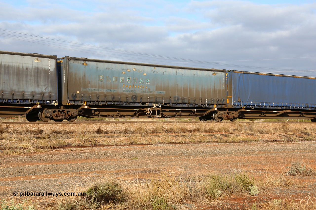 160525 4528
Parkeston, 3PM7 priority service train, RRQY 8344 platform 3 of 5-pack articulated skel waggon set the last of a batch of 41 built by Qiqihar Rollingstock Works China in 2005 for Pacific National, with a Pacific National 48' curtainsider stencilled for Bluestar Logistics PNXC 4491.
Keywords: RRQY-type;RRQY8344;Qiqihar-Rollingstock-Works-China;