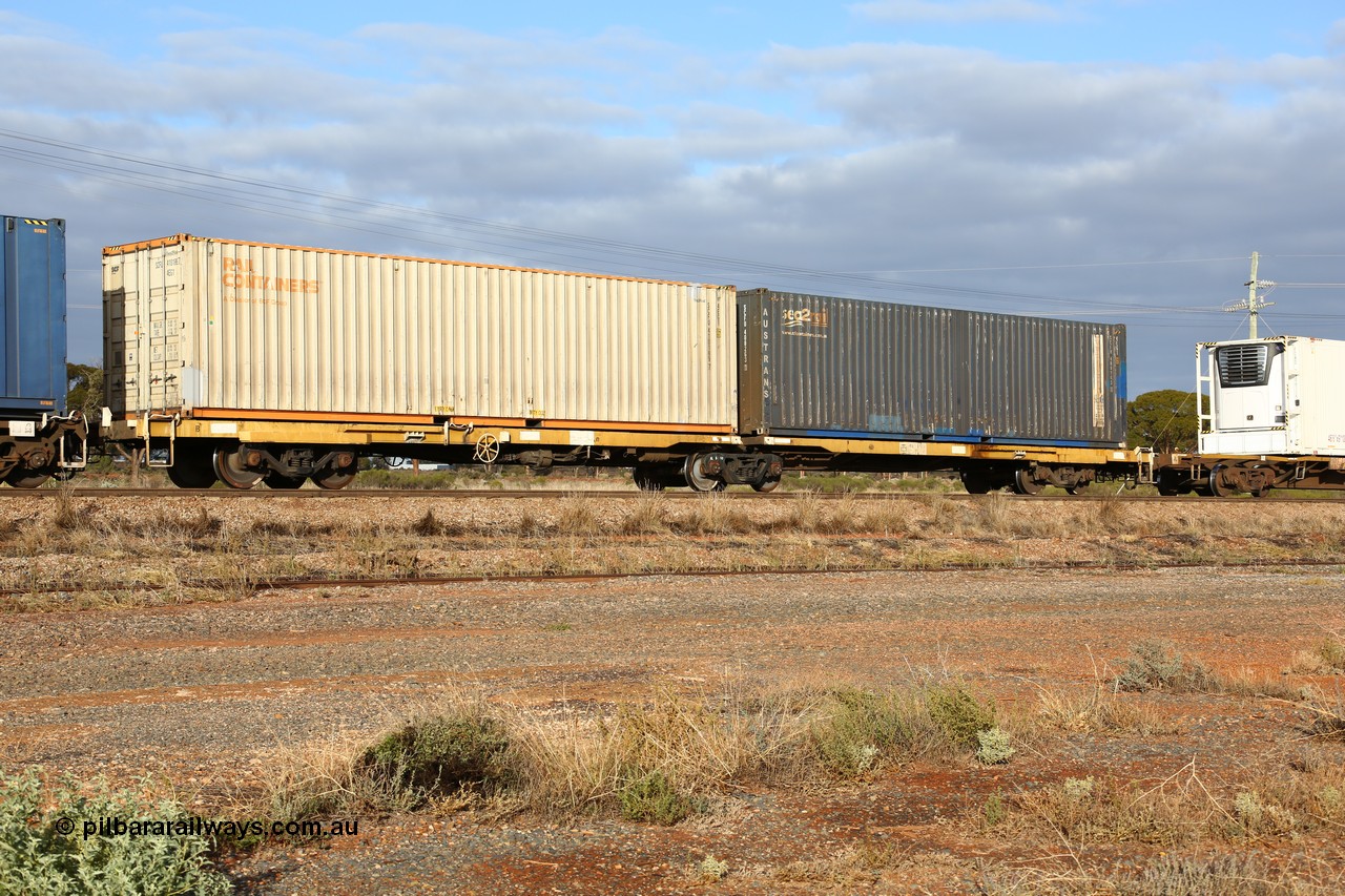 160525 4531
Parkeston, 3PM7 priority service train, RQEY 1962 2-pack container waggon, originally built by Comeng Qld as one of forty LEX type louvre waggons in 1966-67, to ALEX, converted to AQEY, with two 40' boxes, Rail Containers sea2rail SCFU 410189 and Austrans sea2rail SCFU 408263.
Keywords: RQEY-type;RQEY1962;Comeng-Qld;LEX-type;ALEX-type;AQEY-type;